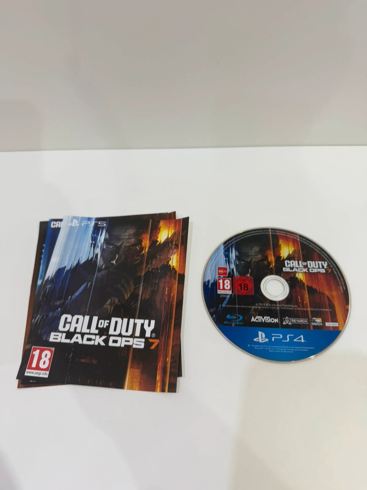 Call of Duty black PS4 game disc and case with cover art.