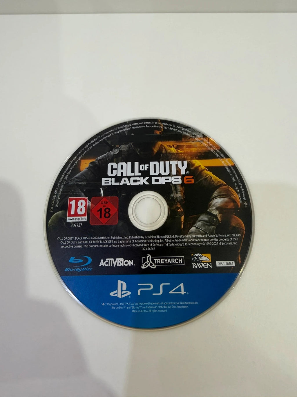 Call of Duty black PS4 game disc with case and cover art.