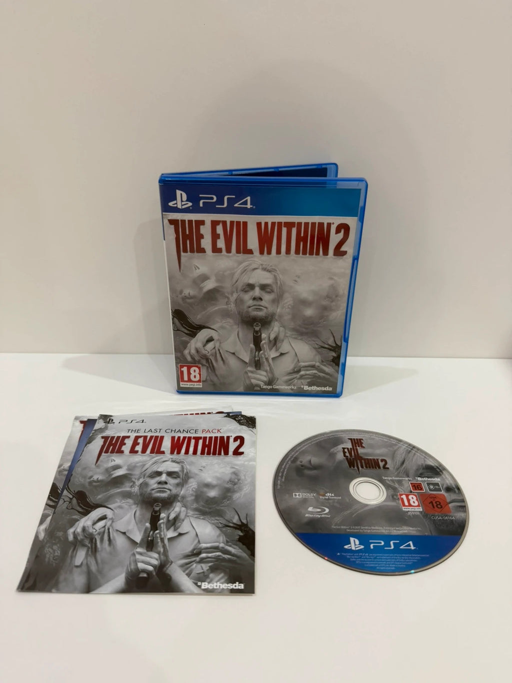 The Evil Within 2 PS4 game case with disc, manual, and cover in very good condition.