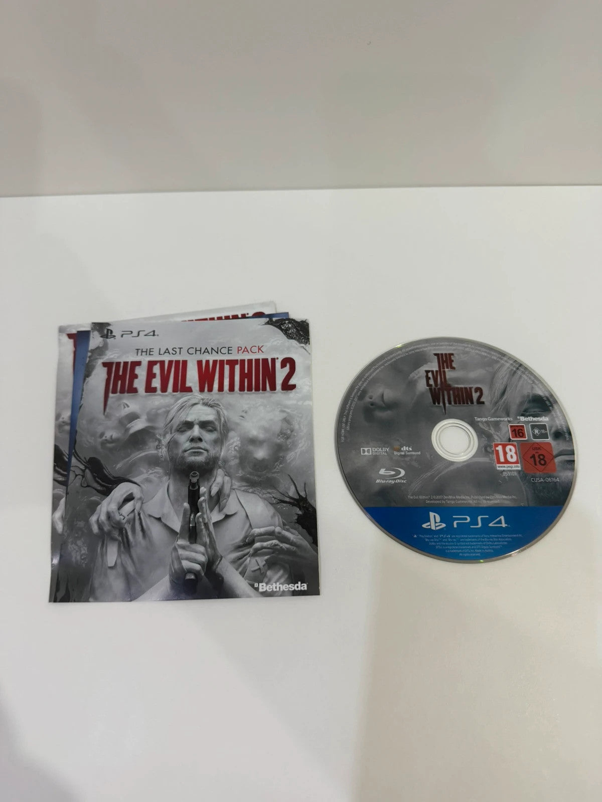 The Evil Within 2 PS4 game case with disc, manual, and cover in very good condition.