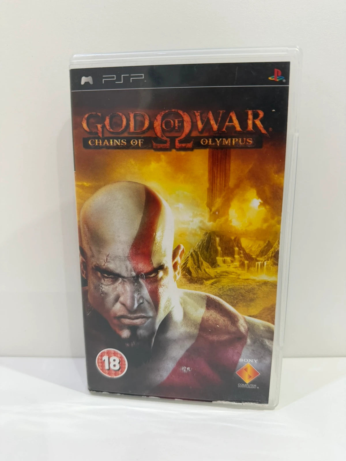God of War Chains of Olympus PSP game complete with manual and cover art.