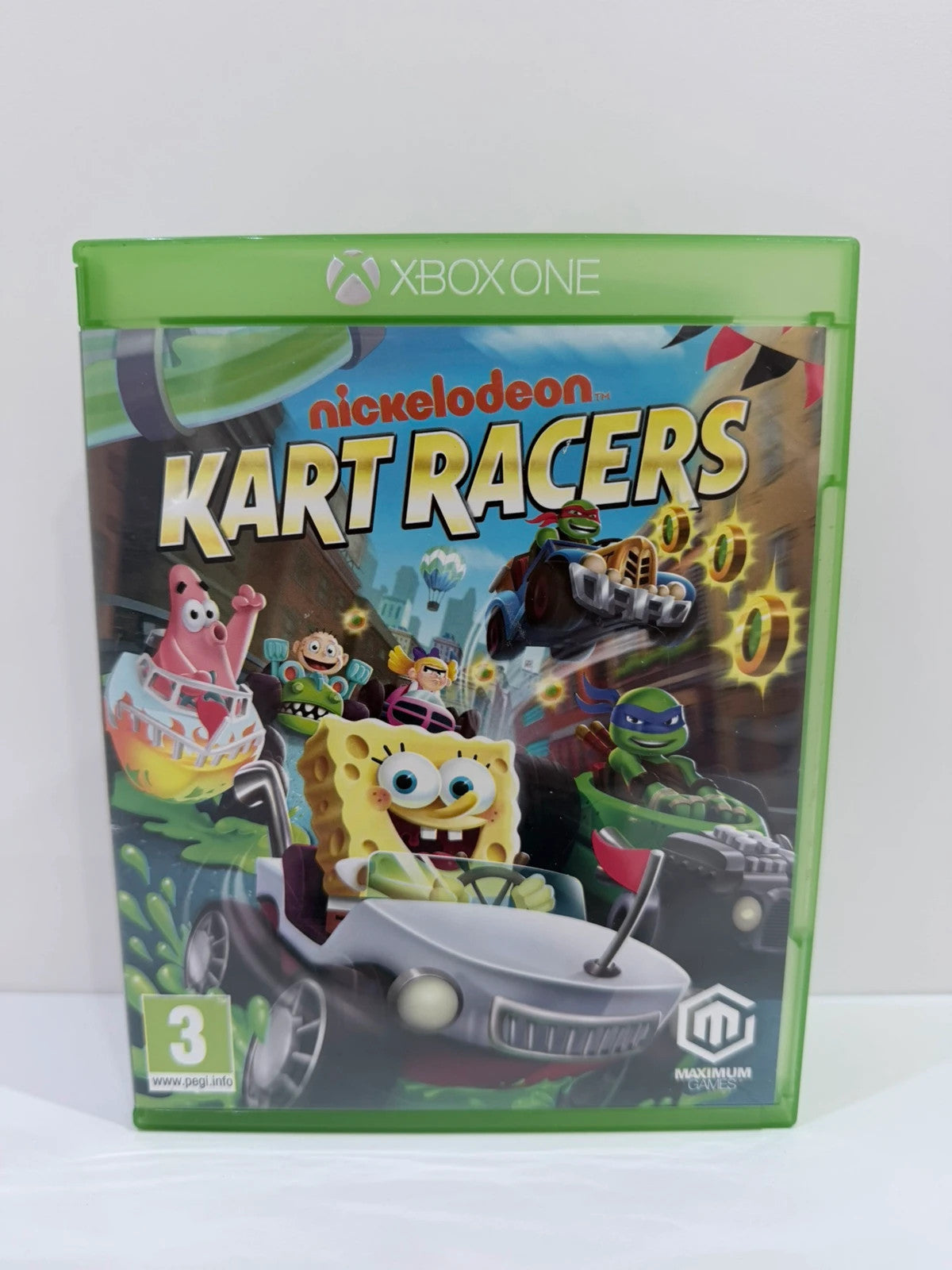 Nickelodeon Kart Racers Xbox One game disc and case with colorful cartoon graphics.