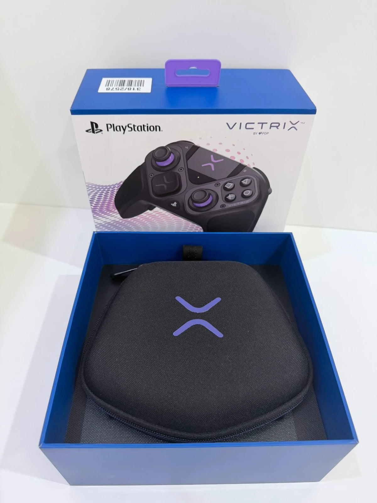 Victrix black wireless game controller with interchangeable buttons and PlayStation logo.