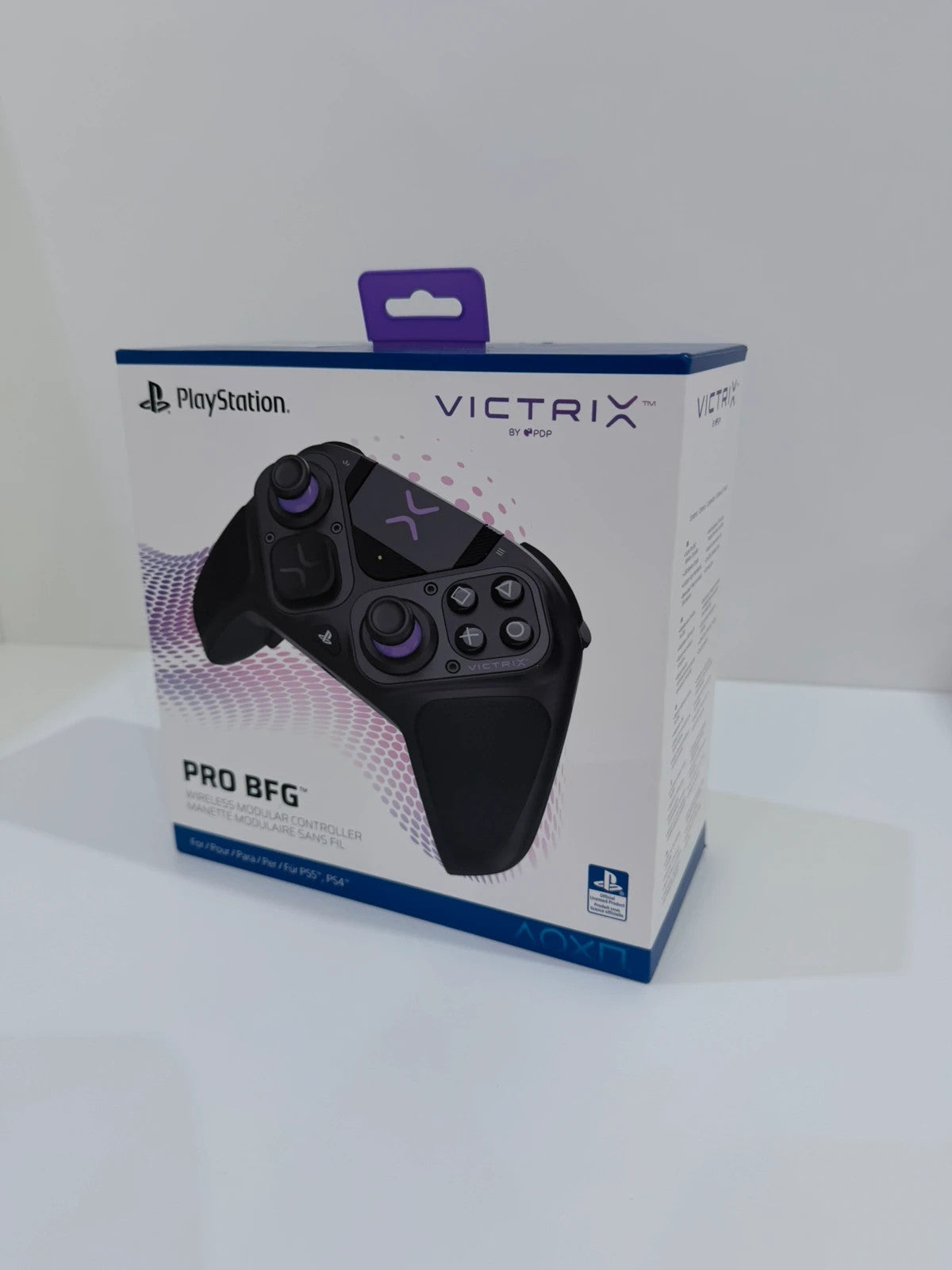 Victrix black wireless game controller with interchangeable buttons and PlayStation logo.