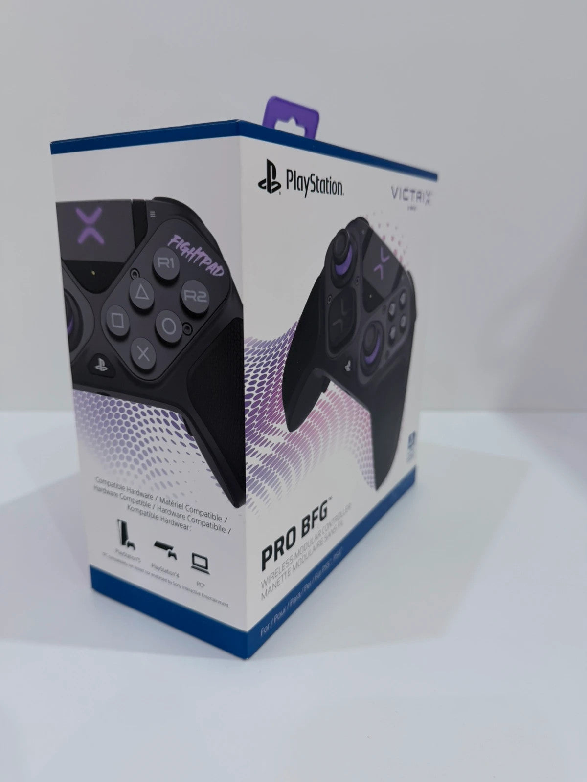 Victrix black wireless game controller with interchangeable buttons and PlayStation logo.