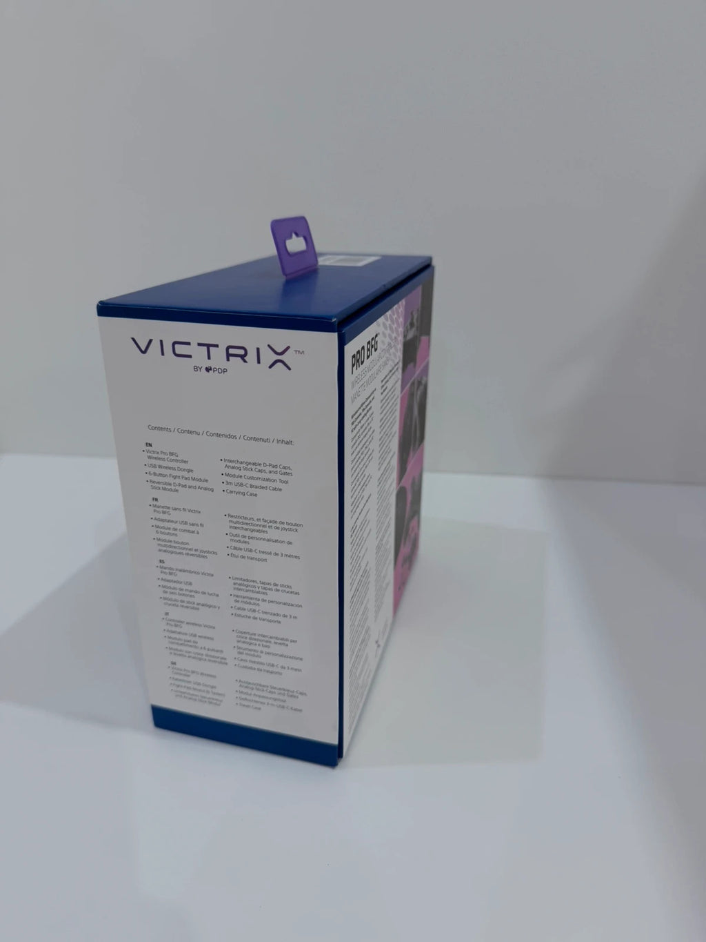 Victrix black wireless game controller with interchangeable buttons and PlayStation logo.