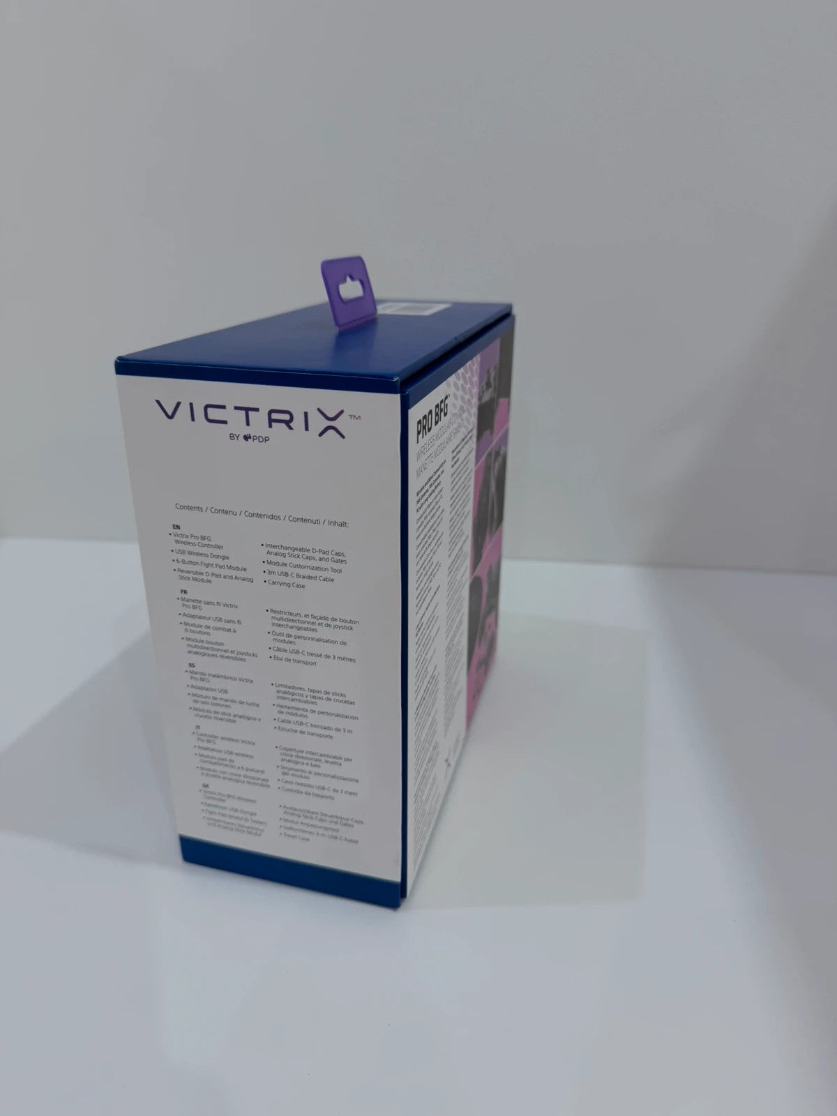 Victrix black wireless game controller with interchangeable buttons and PlayStation logo.