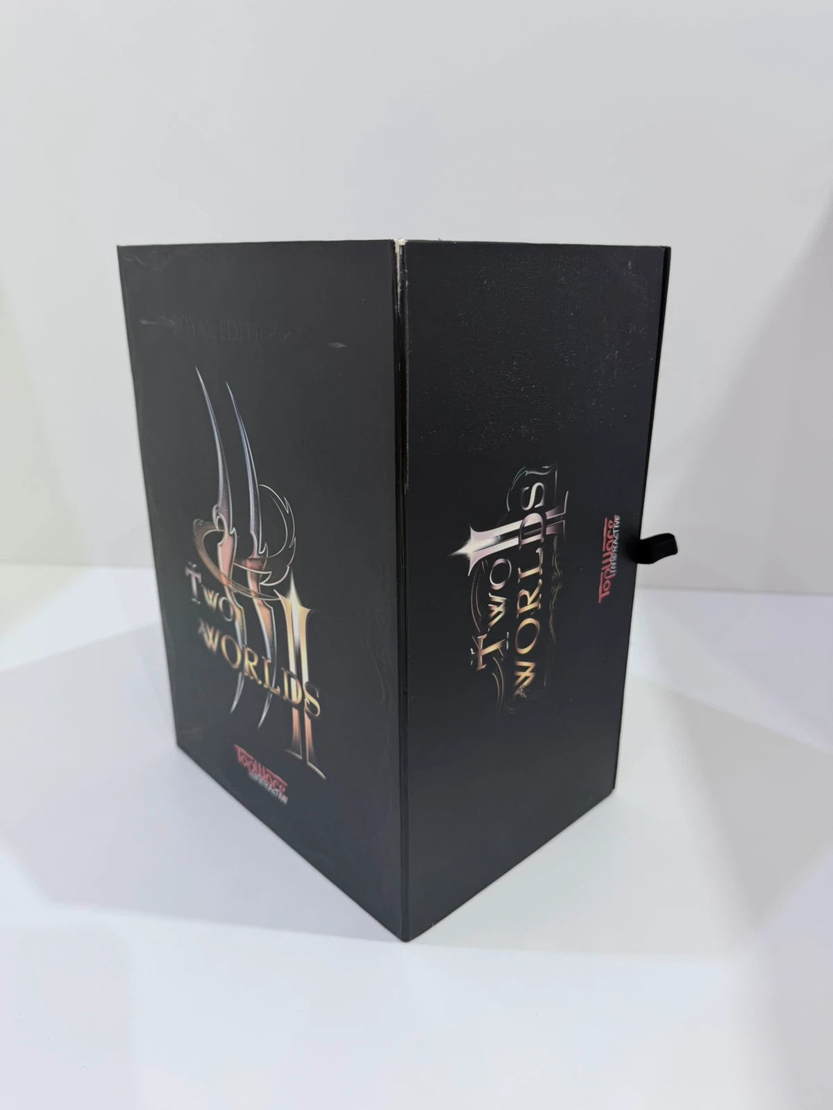 Two Worlds II Royal Edition Xbox 360 collector's statue with detailed artwork and packaging.