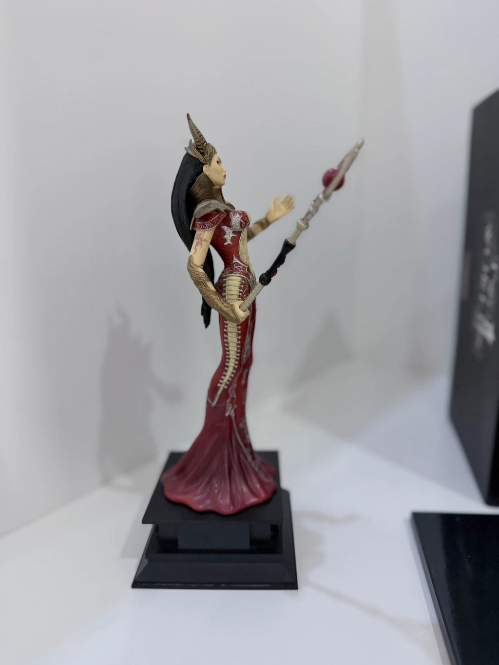 Two Worlds II Royal Edition Xbox 360 collector's statue with detailed artwork and packaging.