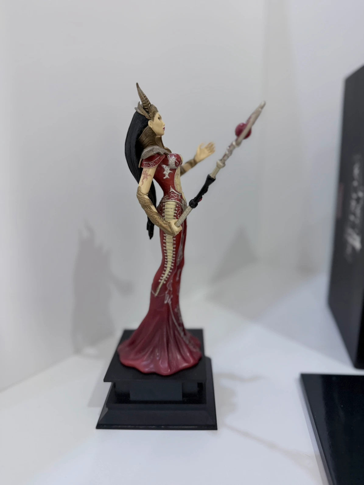 Two Worlds II Royal Edition Xbox 360 collector's statue with detailed artwork and packaging.