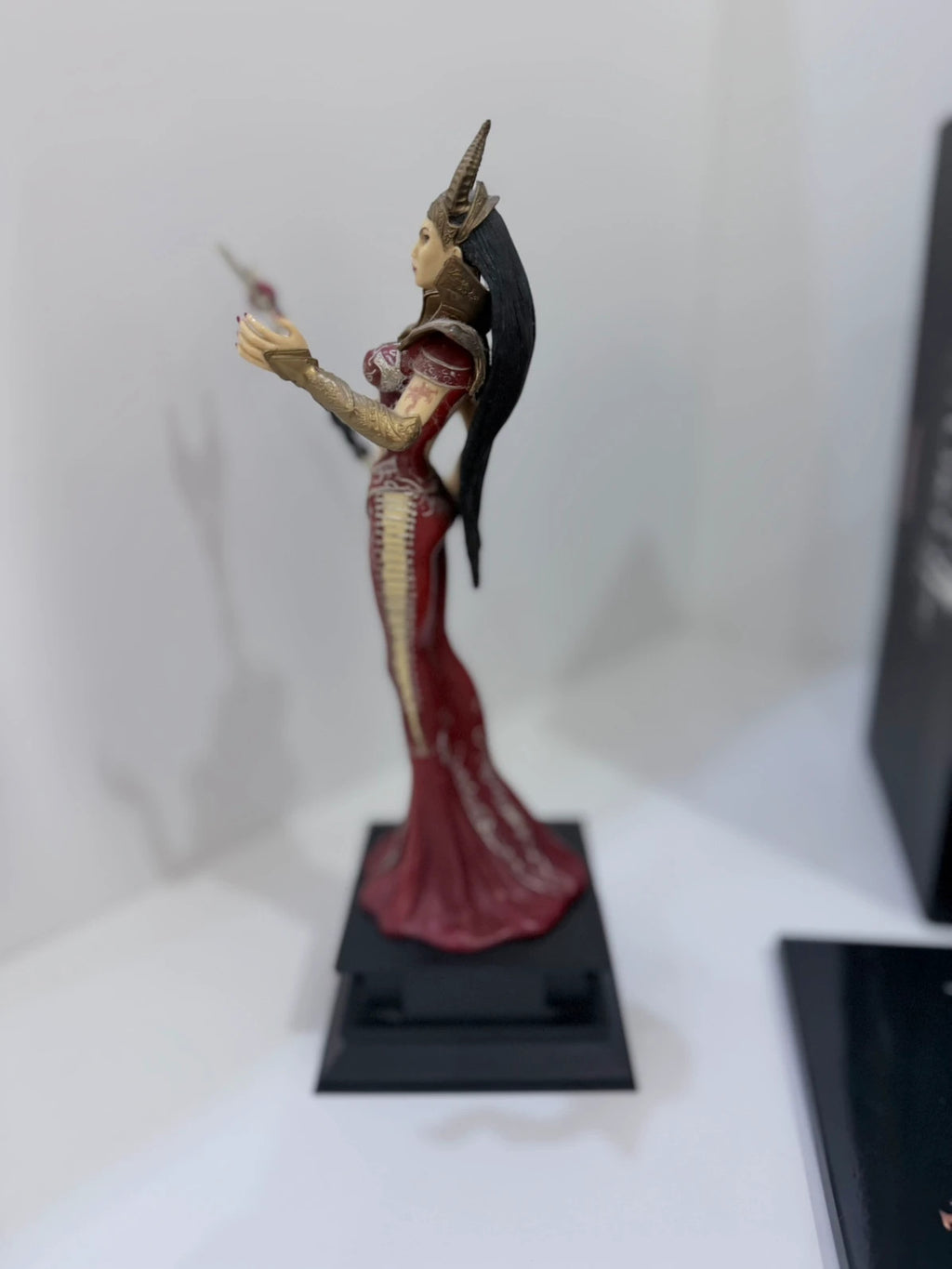 Two Worlds II Royal Edition Xbox 360 collector's statue with detailed artwork and packaging.