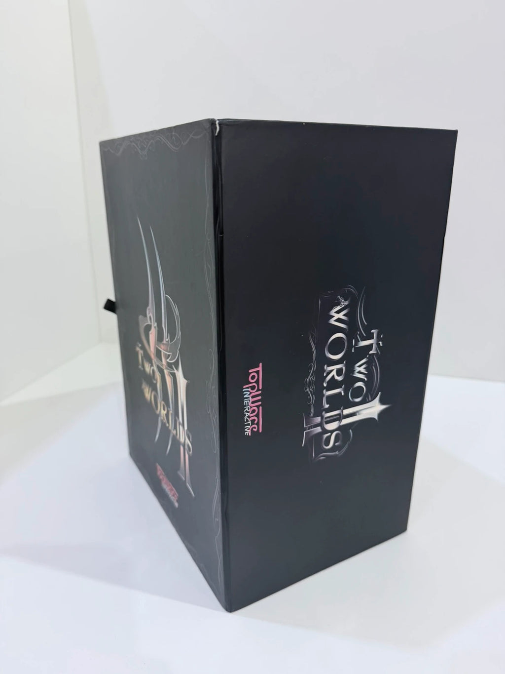 Two Worlds II Royal Edition Xbox 360 collector's statue with detailed artwork and packaging.