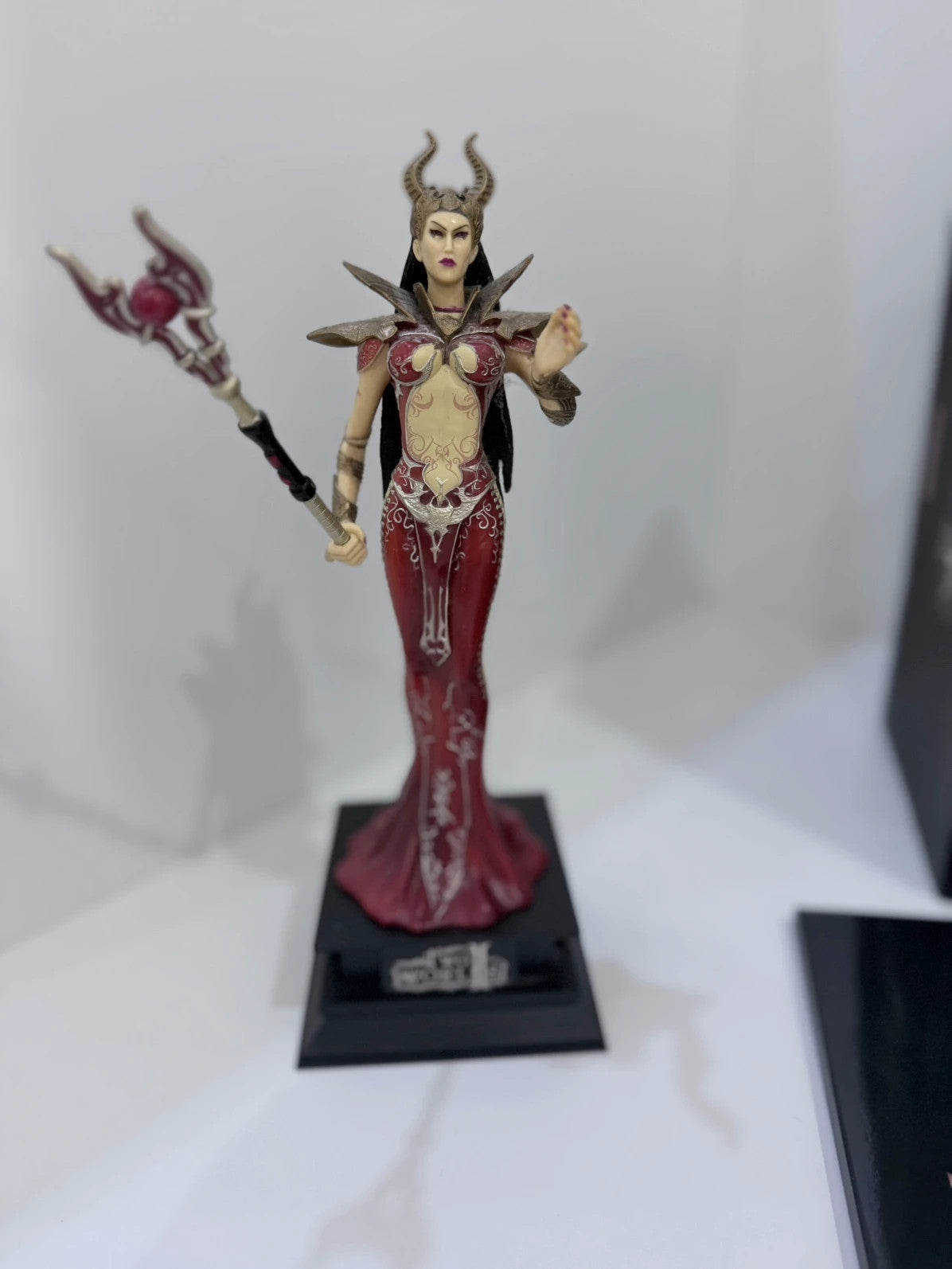 Two Worlds II Royal Edition Xbox 360 collector's statue with detailed artwork and packaging.