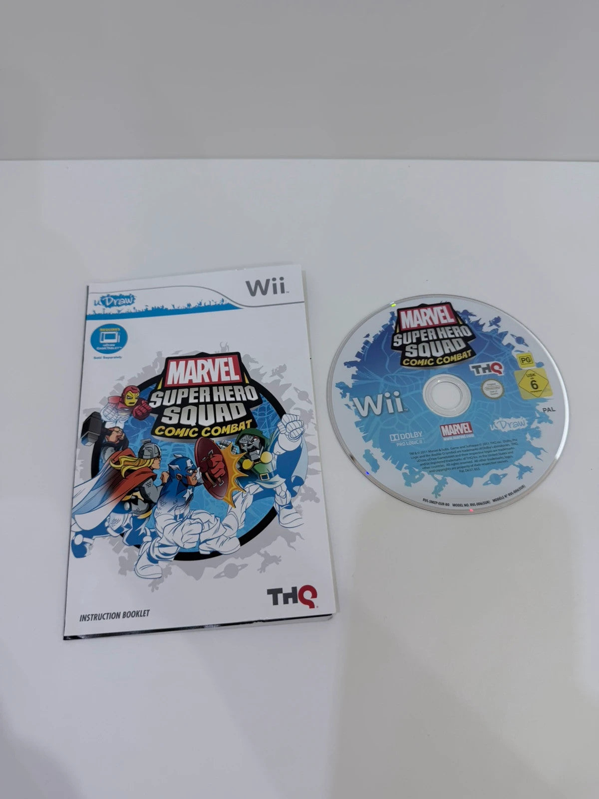 uDraw GameTablet bundle for Nintendo Wii with game cases and accessories included.