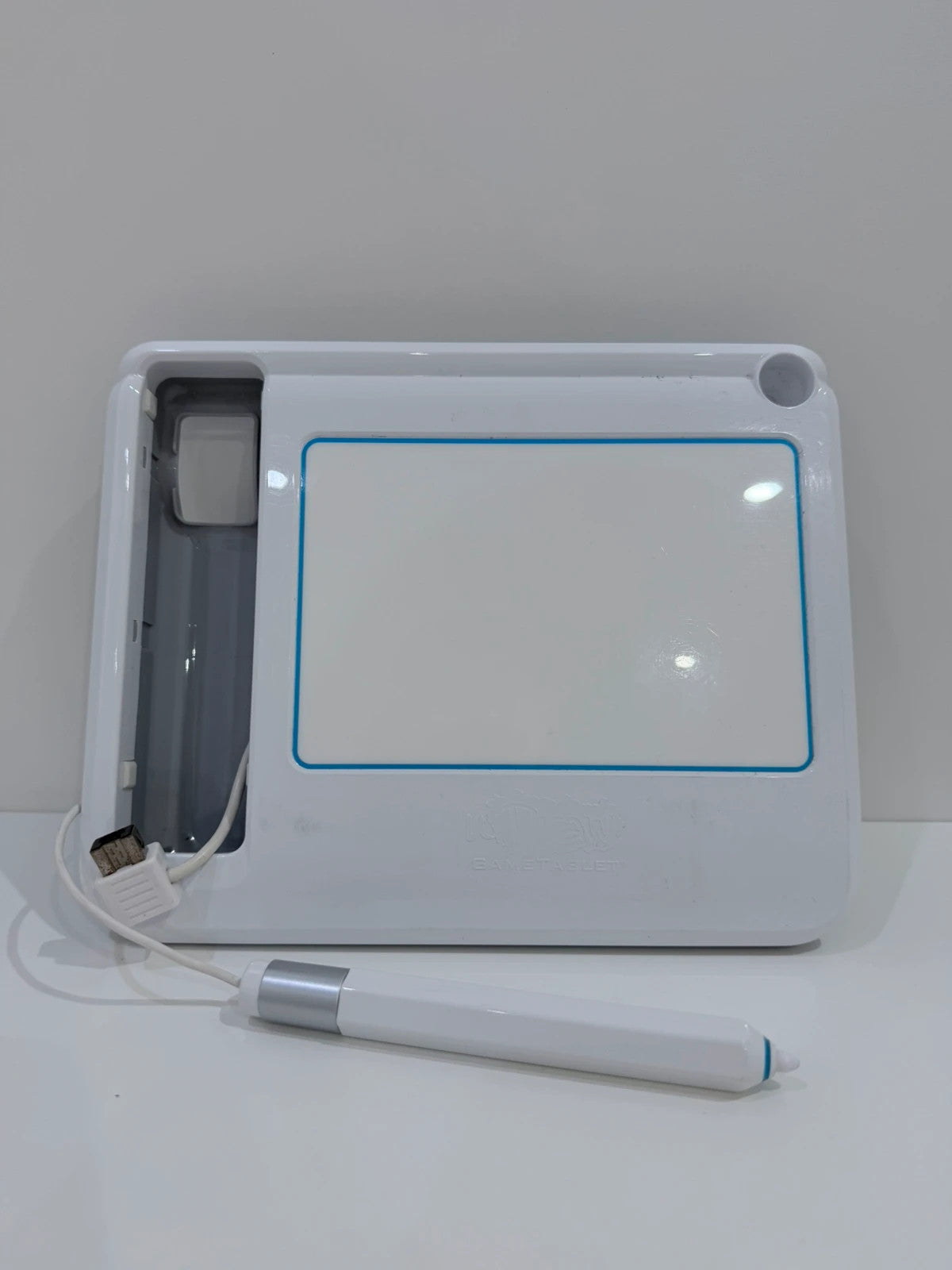 uDraw GameTablet bundle for Nintendo Wii with game cases and accessories included.