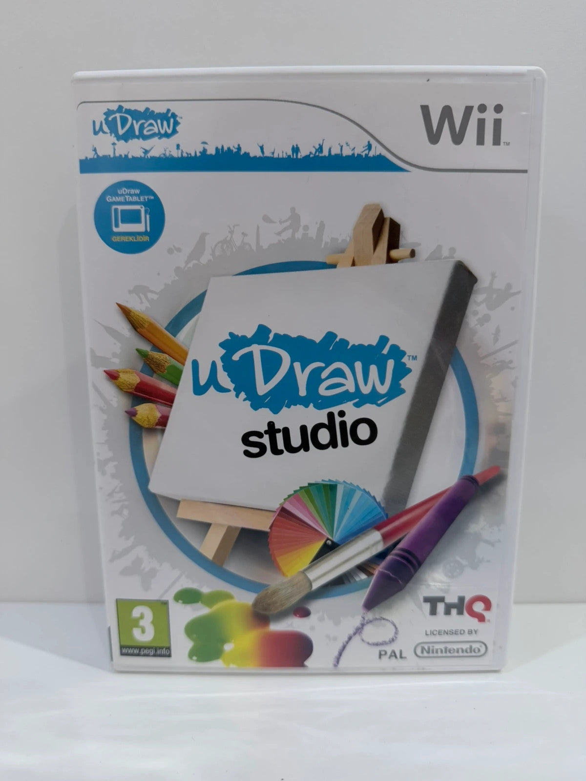 uDraw GameTablet bundle for Nintendo Wii with game cases and accessories included.