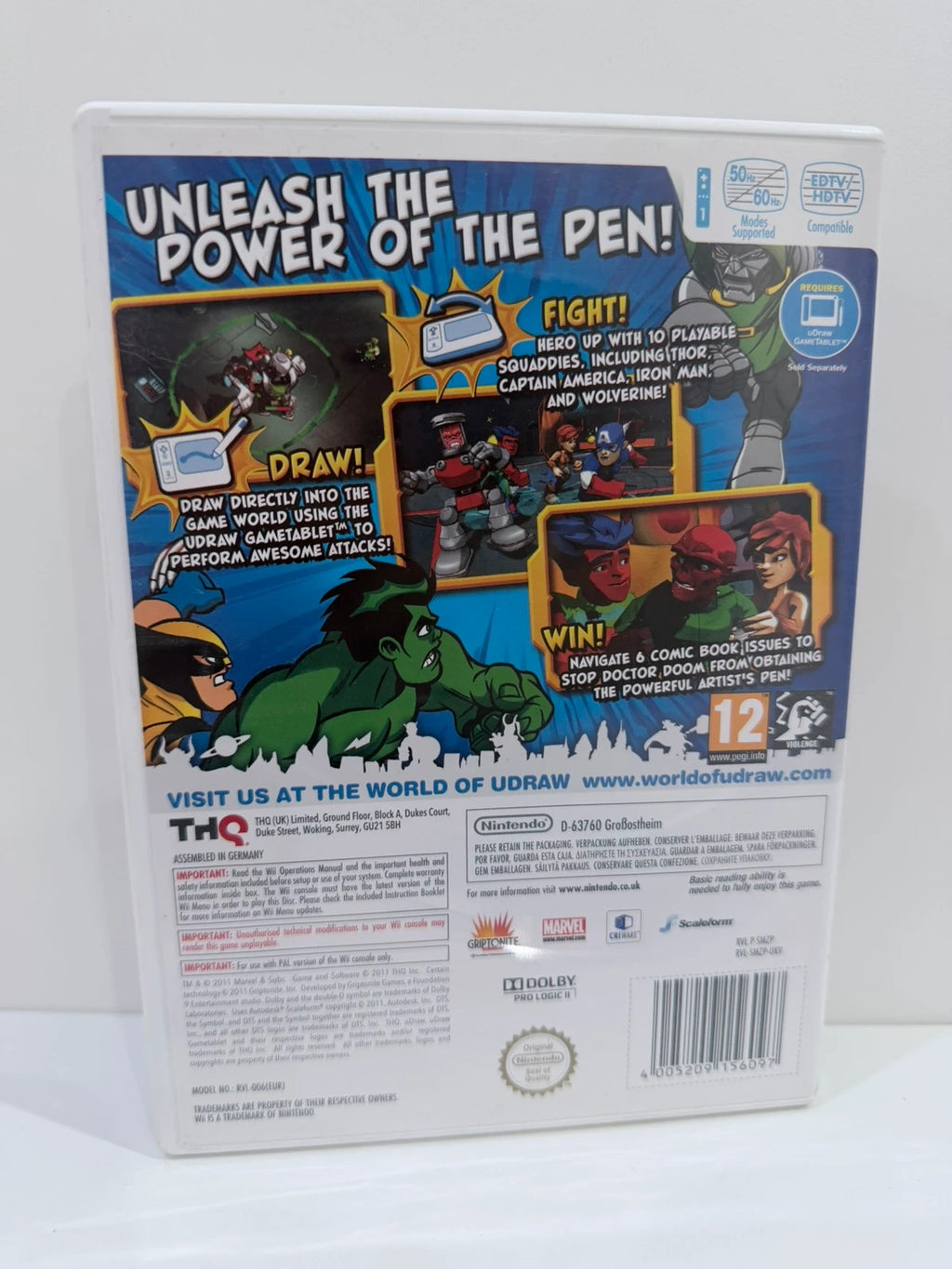 uDraw GameTablet bundle for Nintendo Wii with game cases and accessories included.