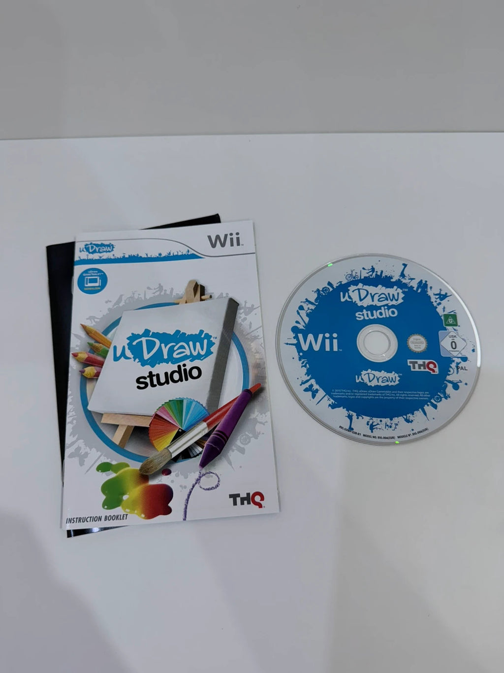 uDraw GameTablet bundle for Nintendo Wii with game cases and accessories included.