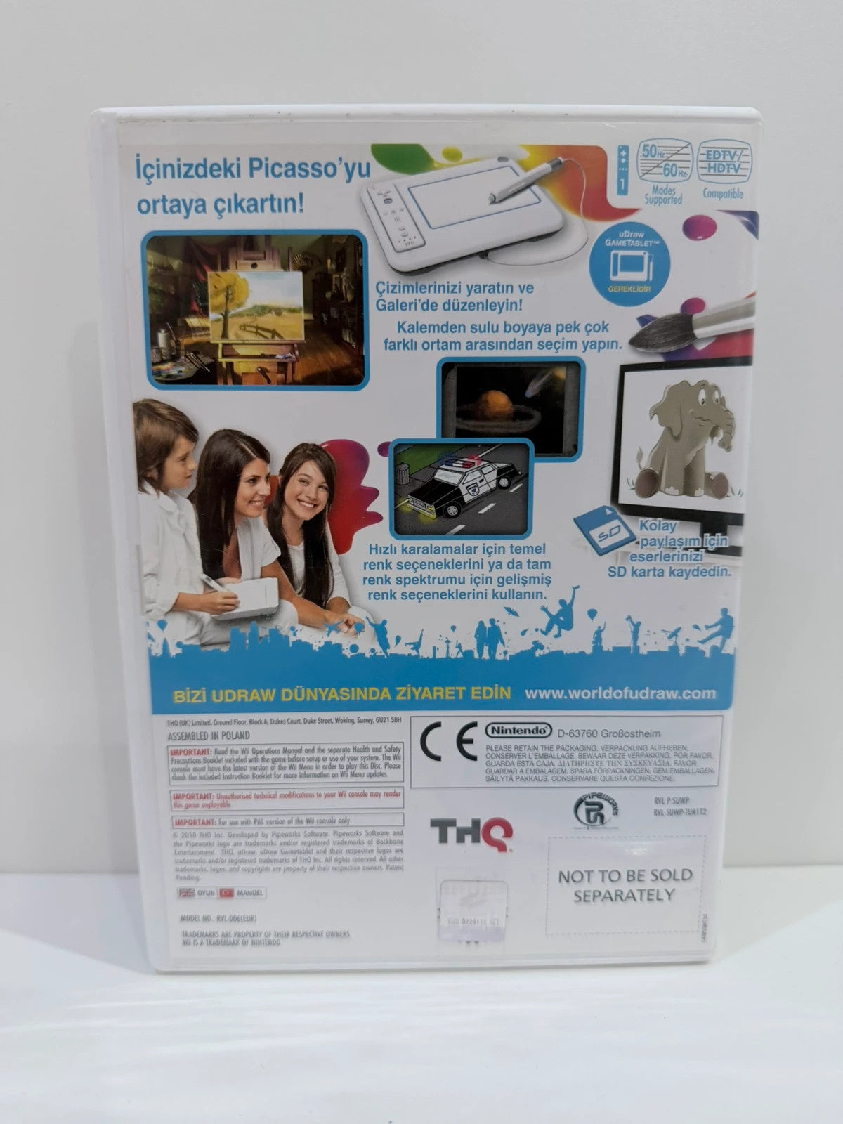 uDraw GameTablet bundle for Nintendo Wii with game cases and accessories included.