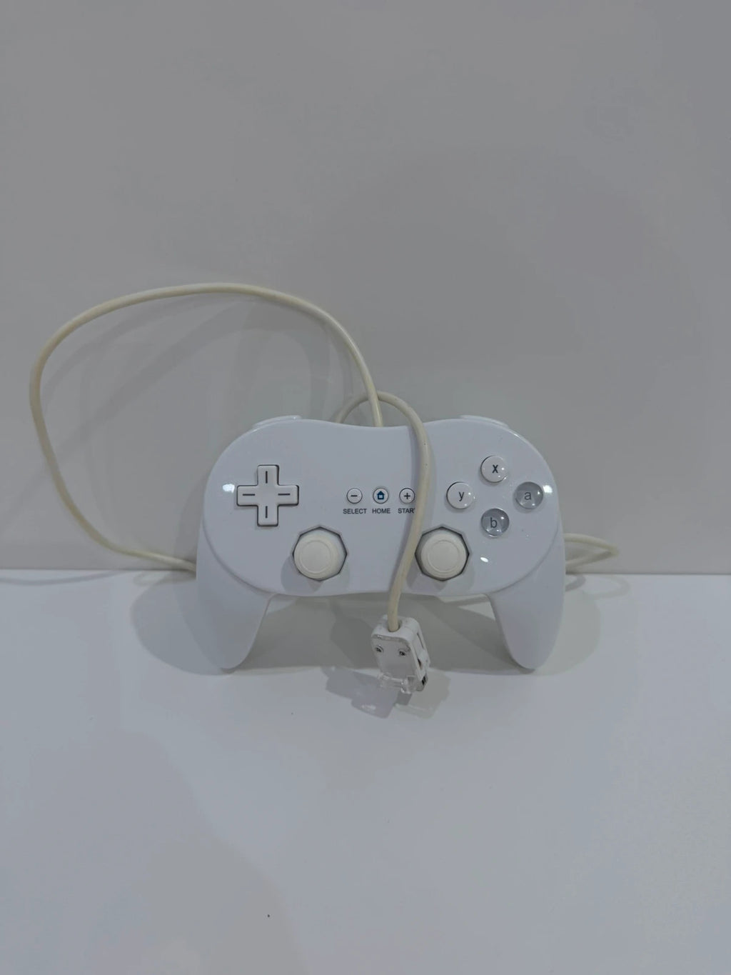 Generic white Nintendo Wii compatible Pro Controller with ergonomic design and button layout.