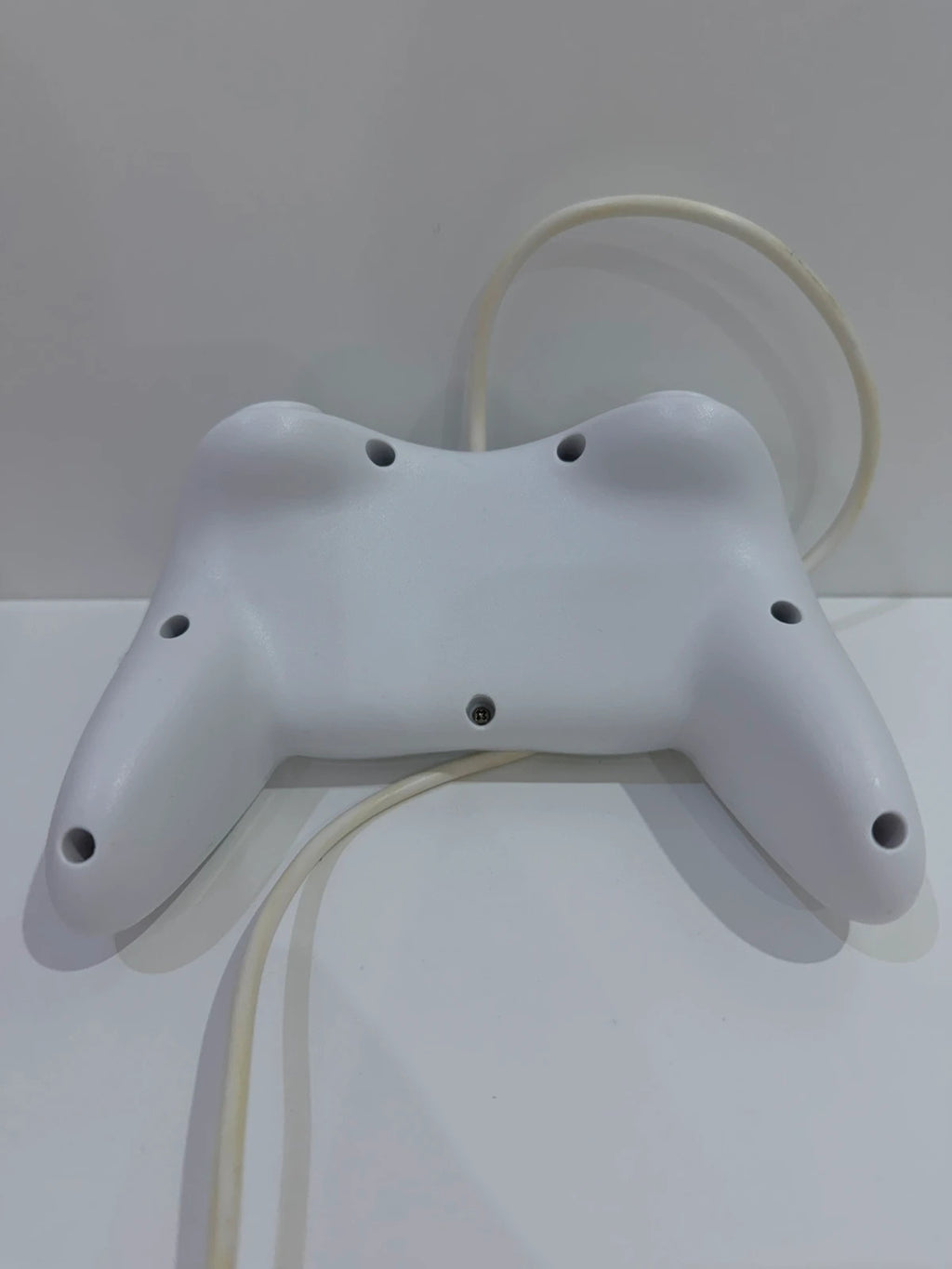 Generic white Nintendo Wii compatible Pro Controller with ergonomic design and button layout.