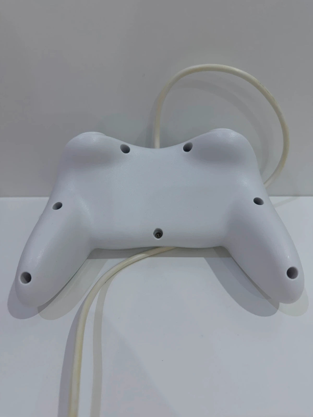 Generic white Nintendo Wii compatible Pro Controller with ergonomic design and button layout.