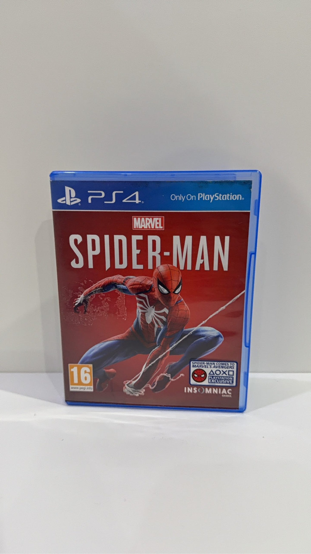 Marvel Spider-Man PS4 video game with original case, cover artwork, disc, and manual.
