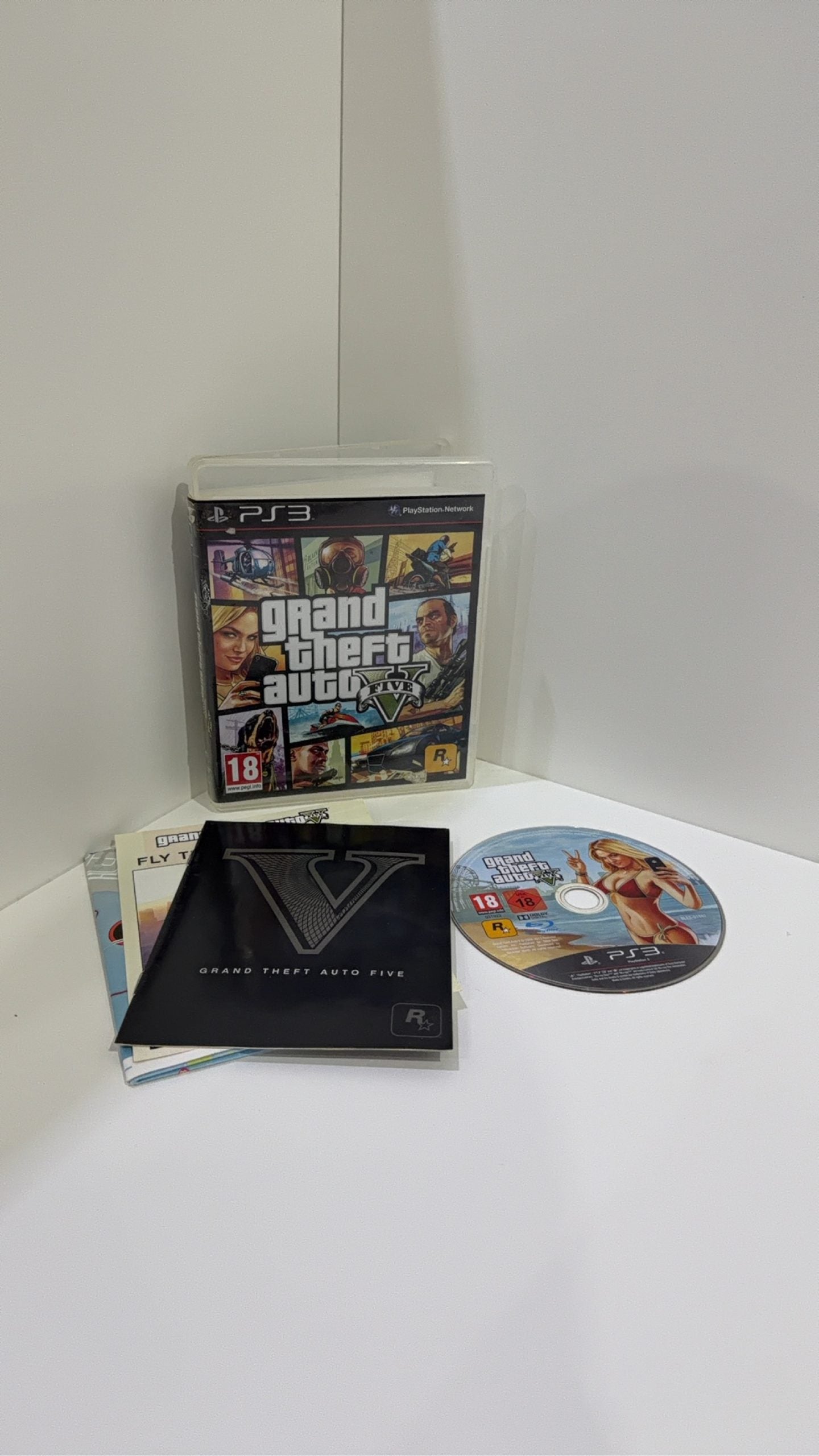 Grand Theft Auto V for Sony PlayStation 3, complete with manual and map, PAL UK.