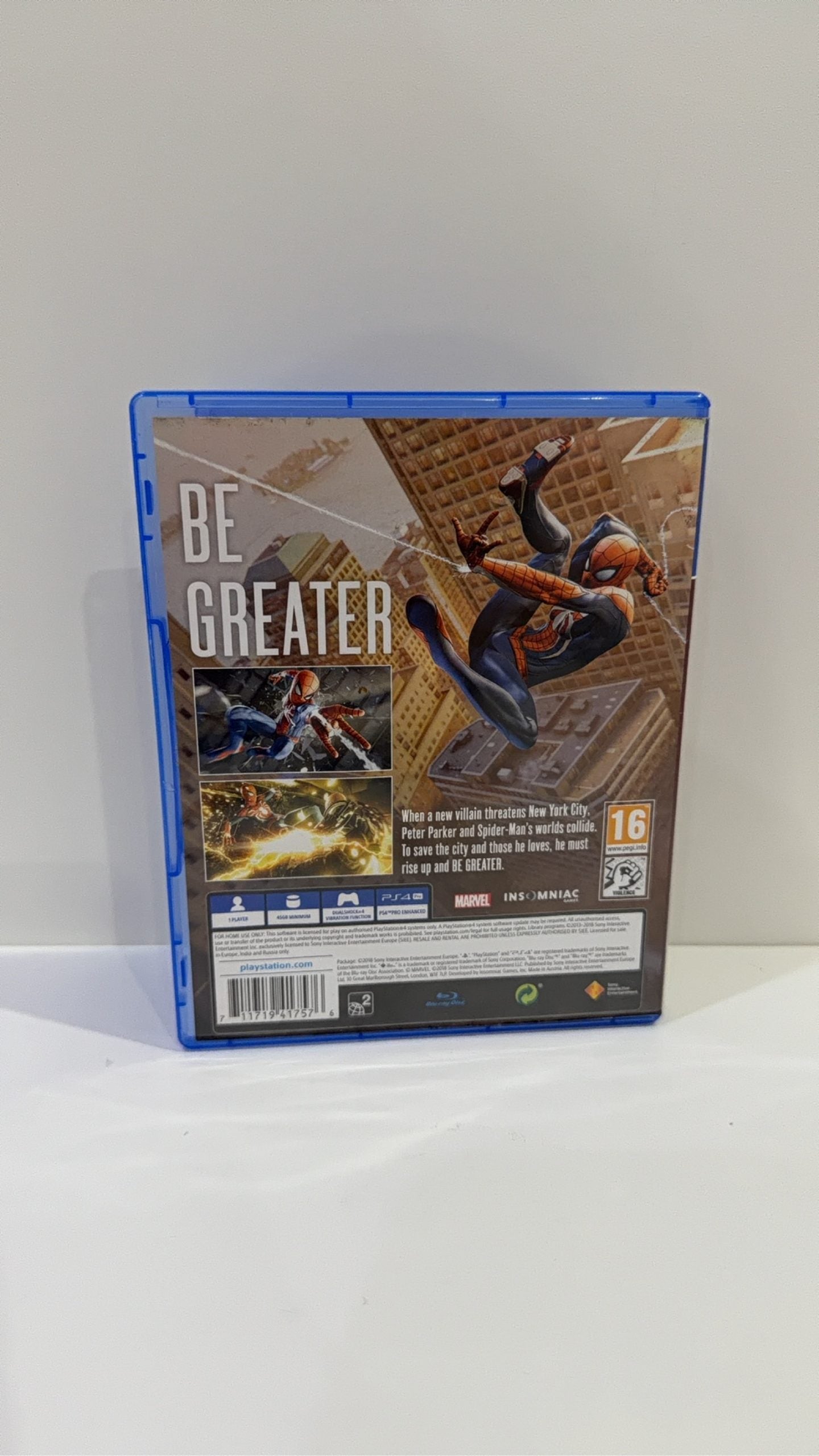 Marvel Spider-Man PS4 video game with original case, cover artwork, disc, and manual.