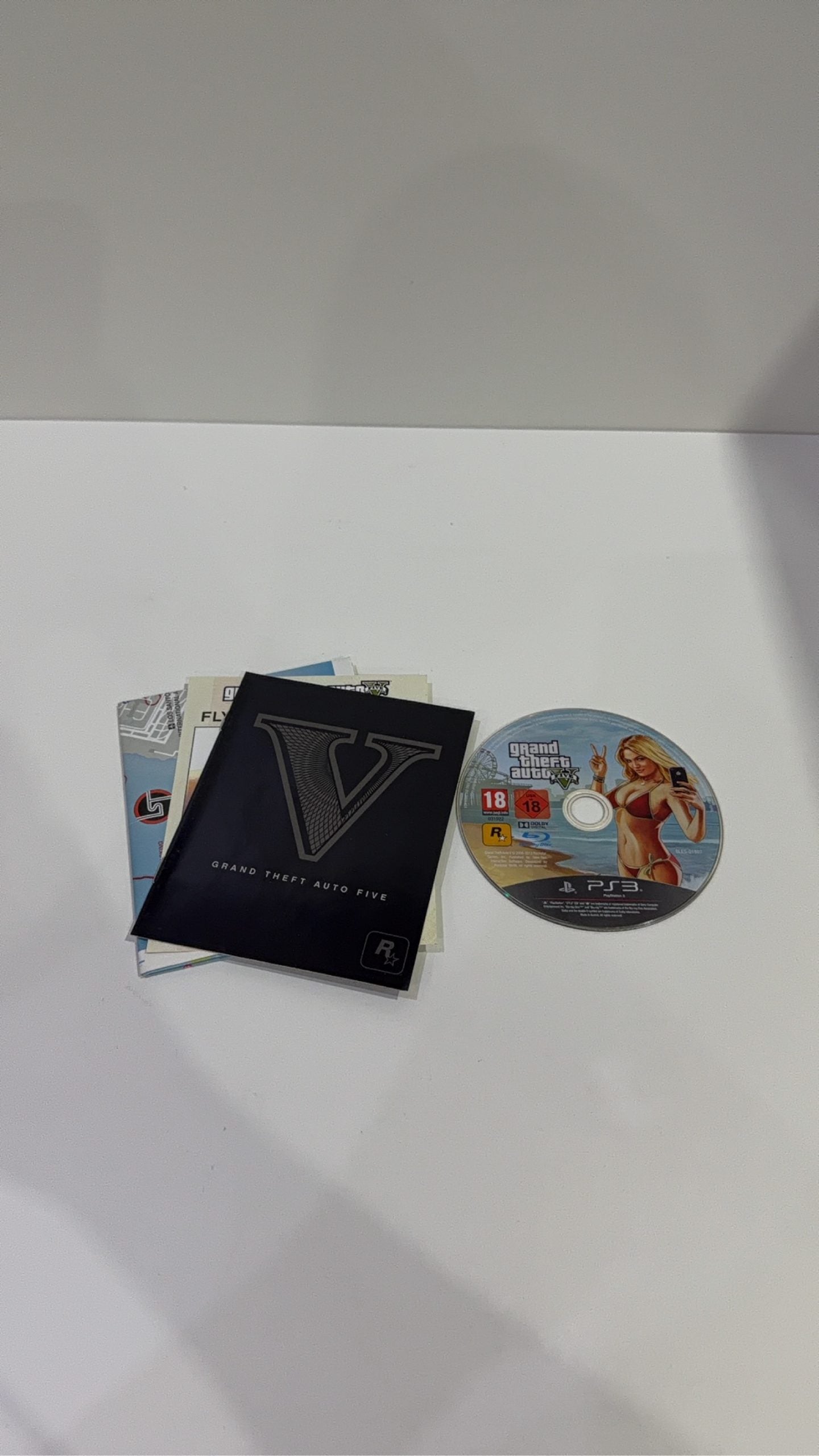 Grand Theft Auto V for Sony PlayStation 3, complete with manual and map, PAL UK.