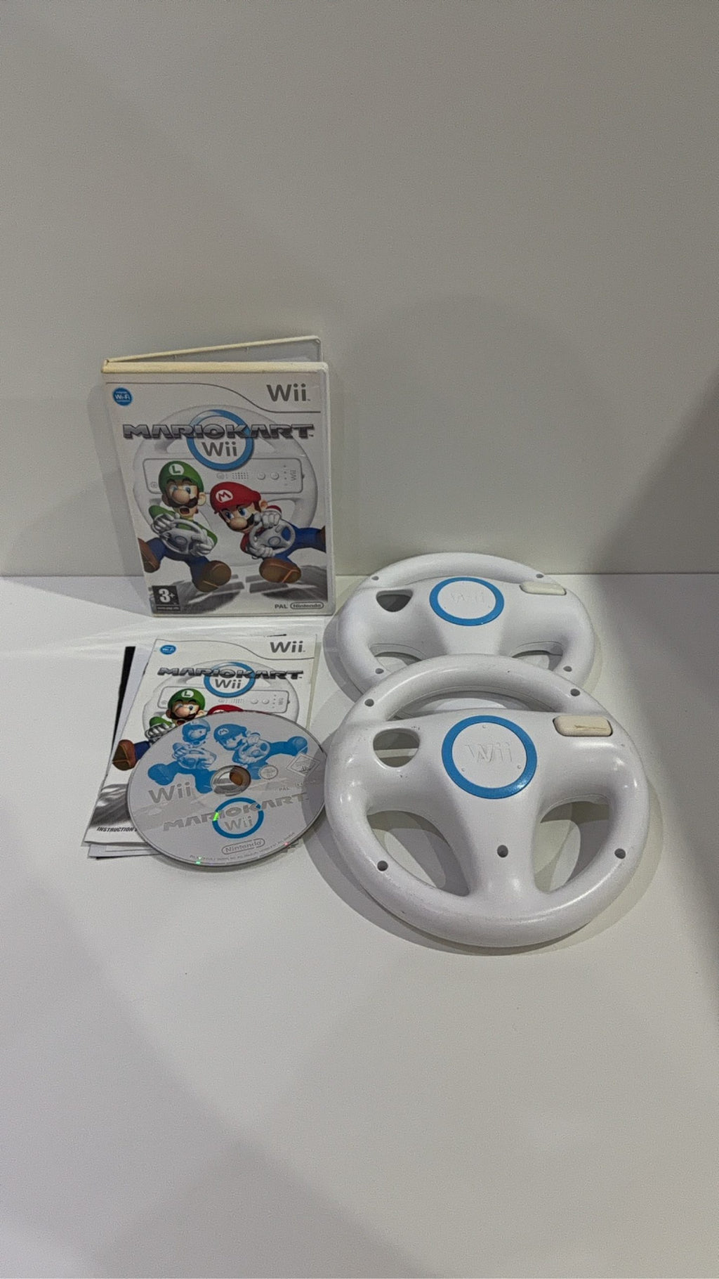 Mario Kart Wii for Nintendo Wii with manual and 2 steering wheels, PAL UK.