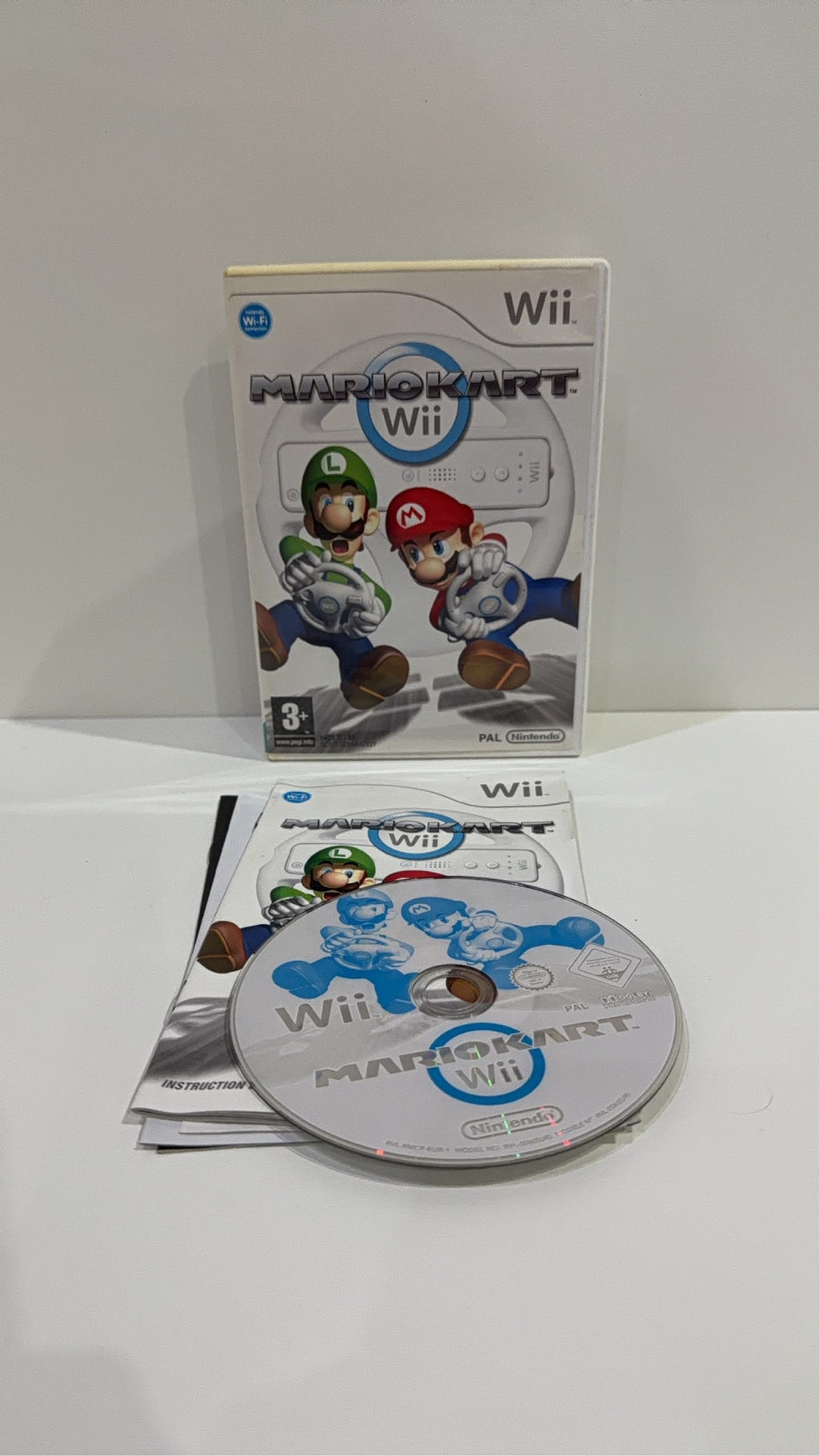 Mario Kart Wii for Nintendo Wii with manual and 2 steering wheels, PAL UK.