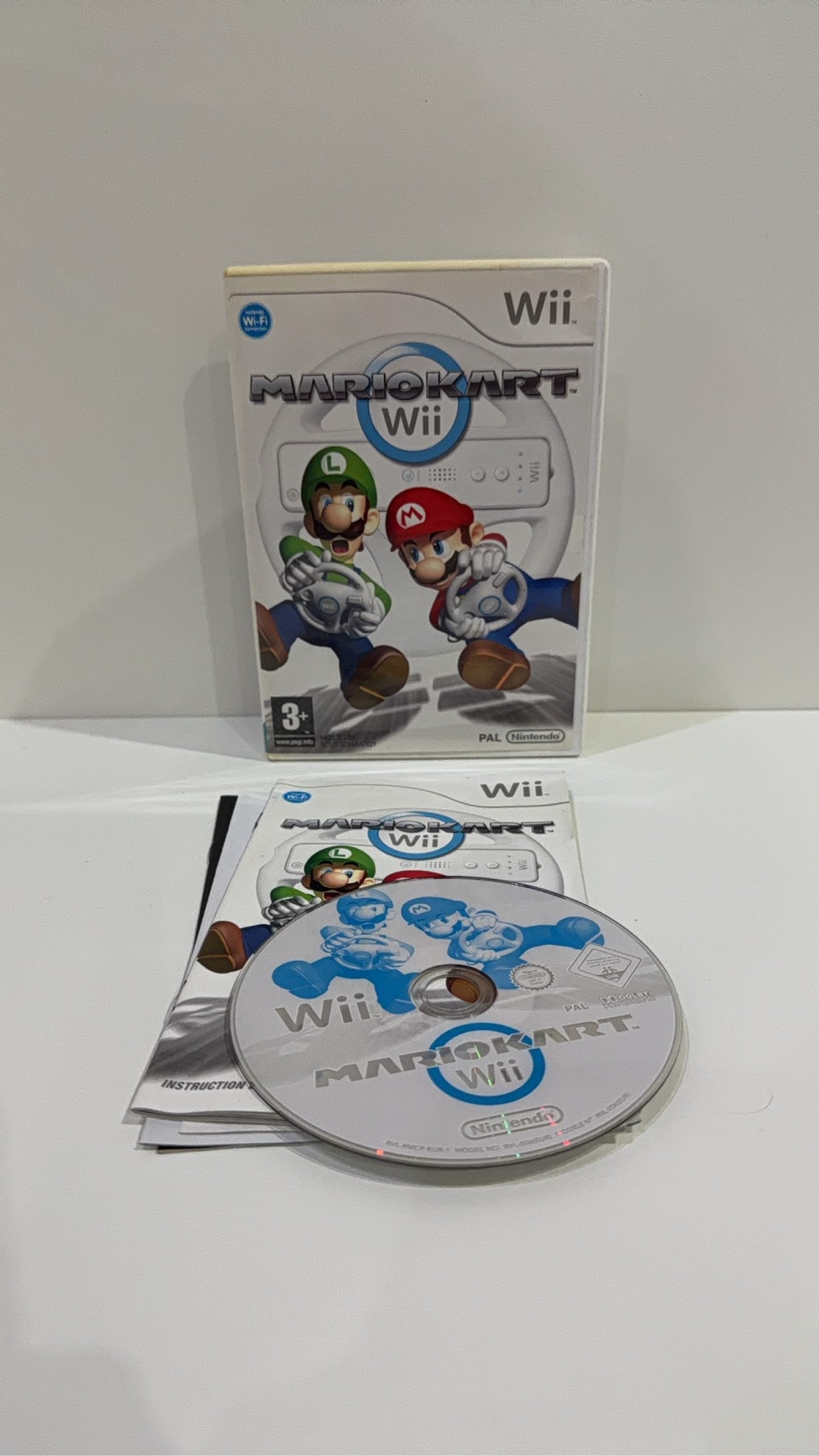 Mario Kart Wii for Nintendo Wii with manual and 2 steering wheels, PAL UK.