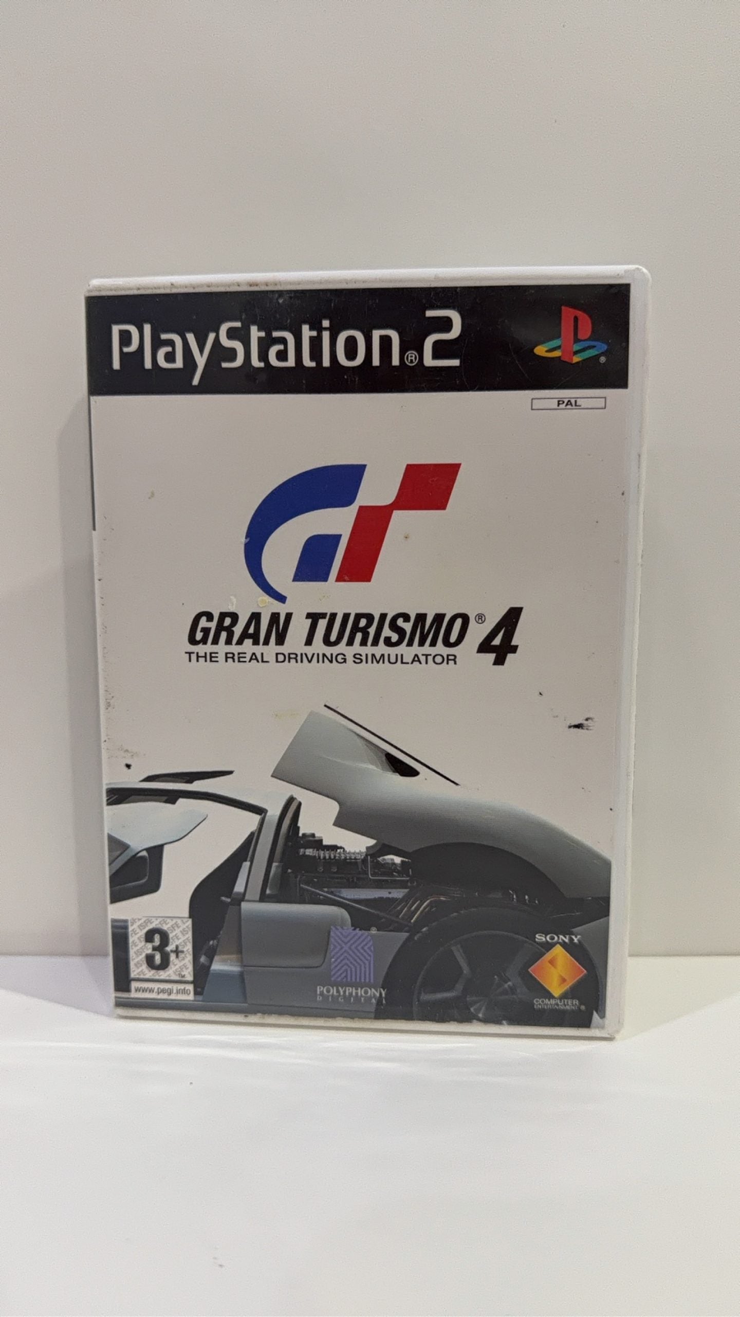 Gran Turismo 4 for Sony PlayStation 2 PS2, complete with case, manual, and game disc.