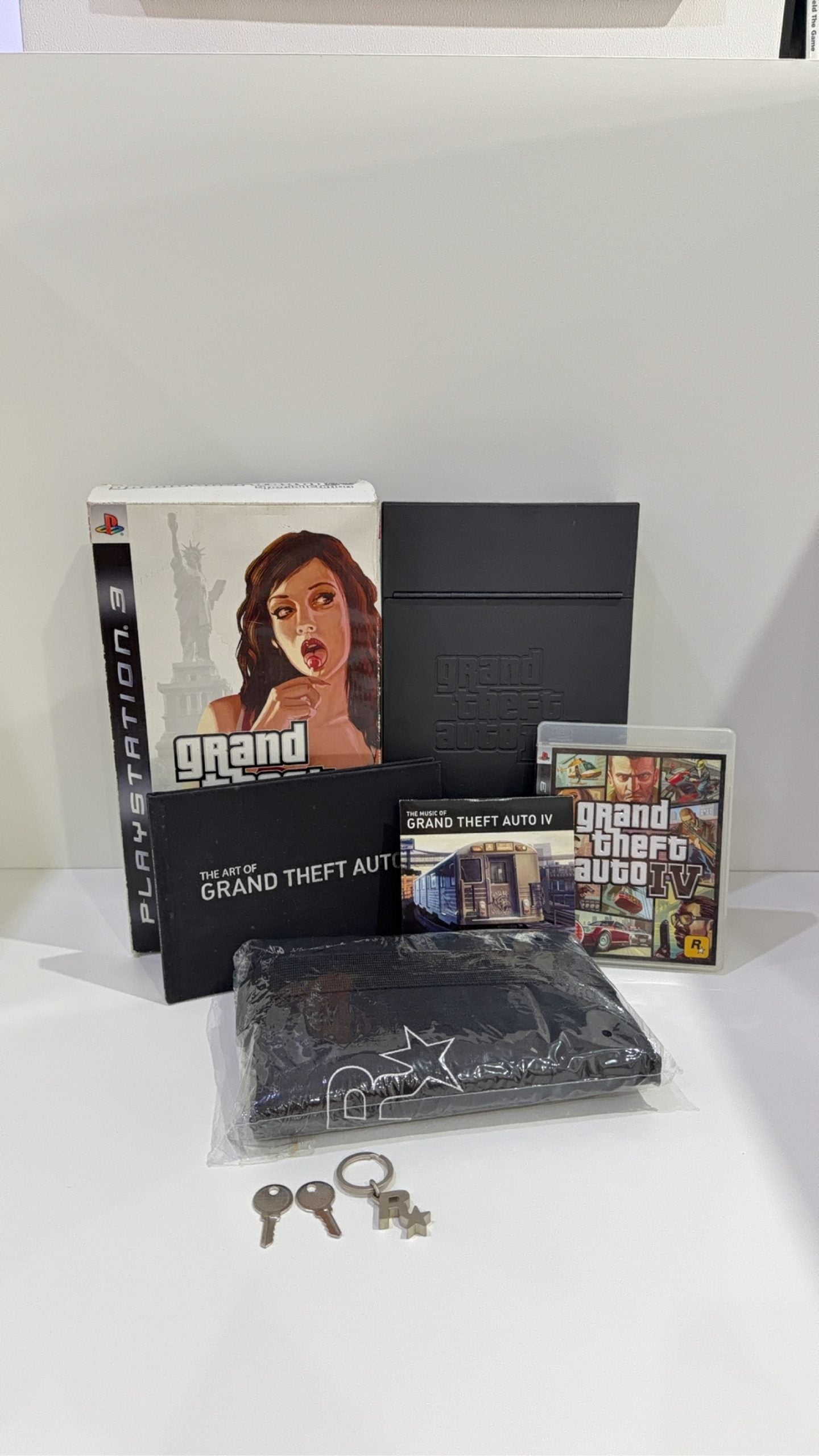 Grand Theft Auto IV Special Edition PS3 complete collector's set with game and metal lockbox.