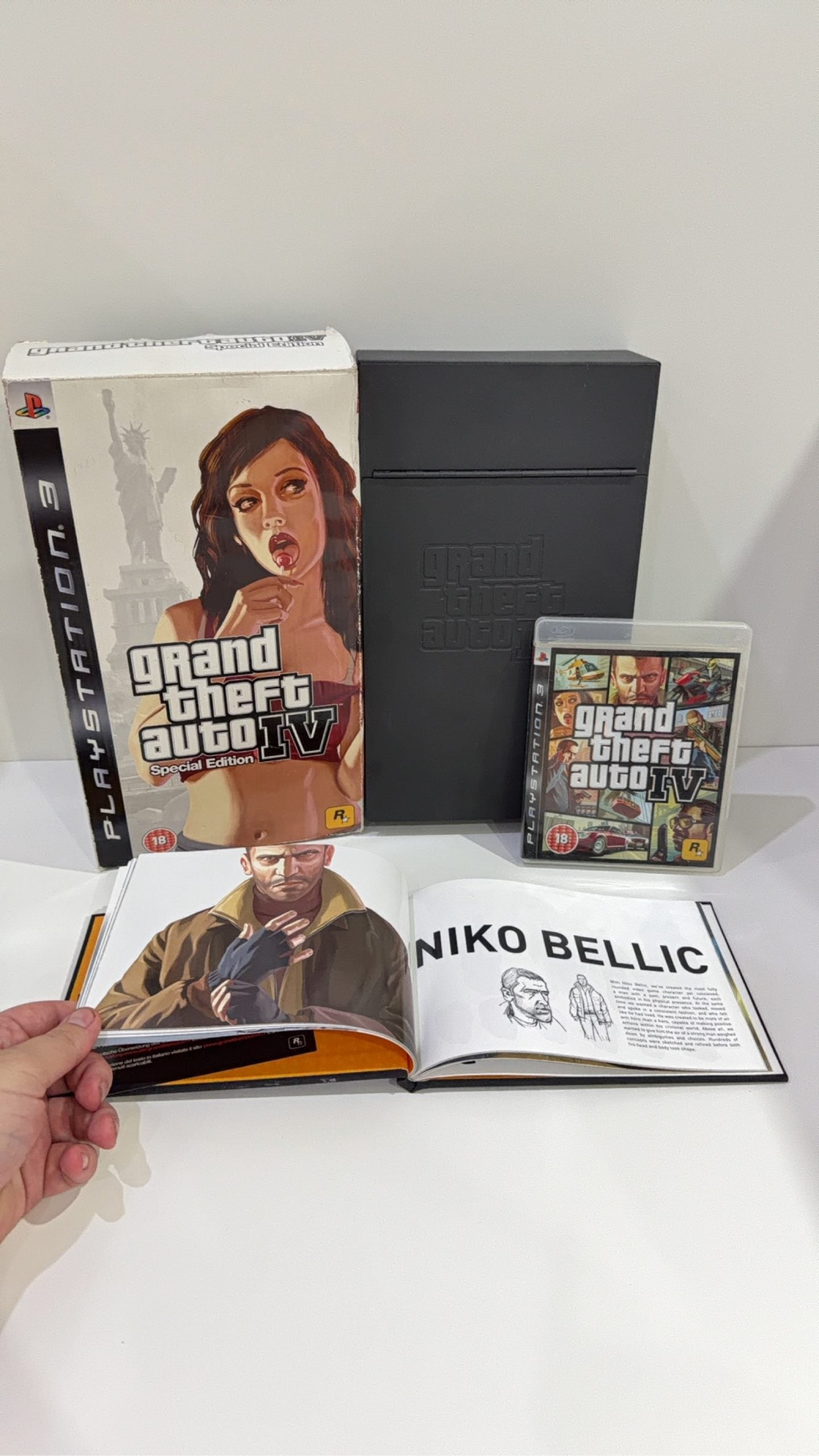 Grand Theft Auto IV Special Edition PS3 complete collector's set with game and metal lockbox.