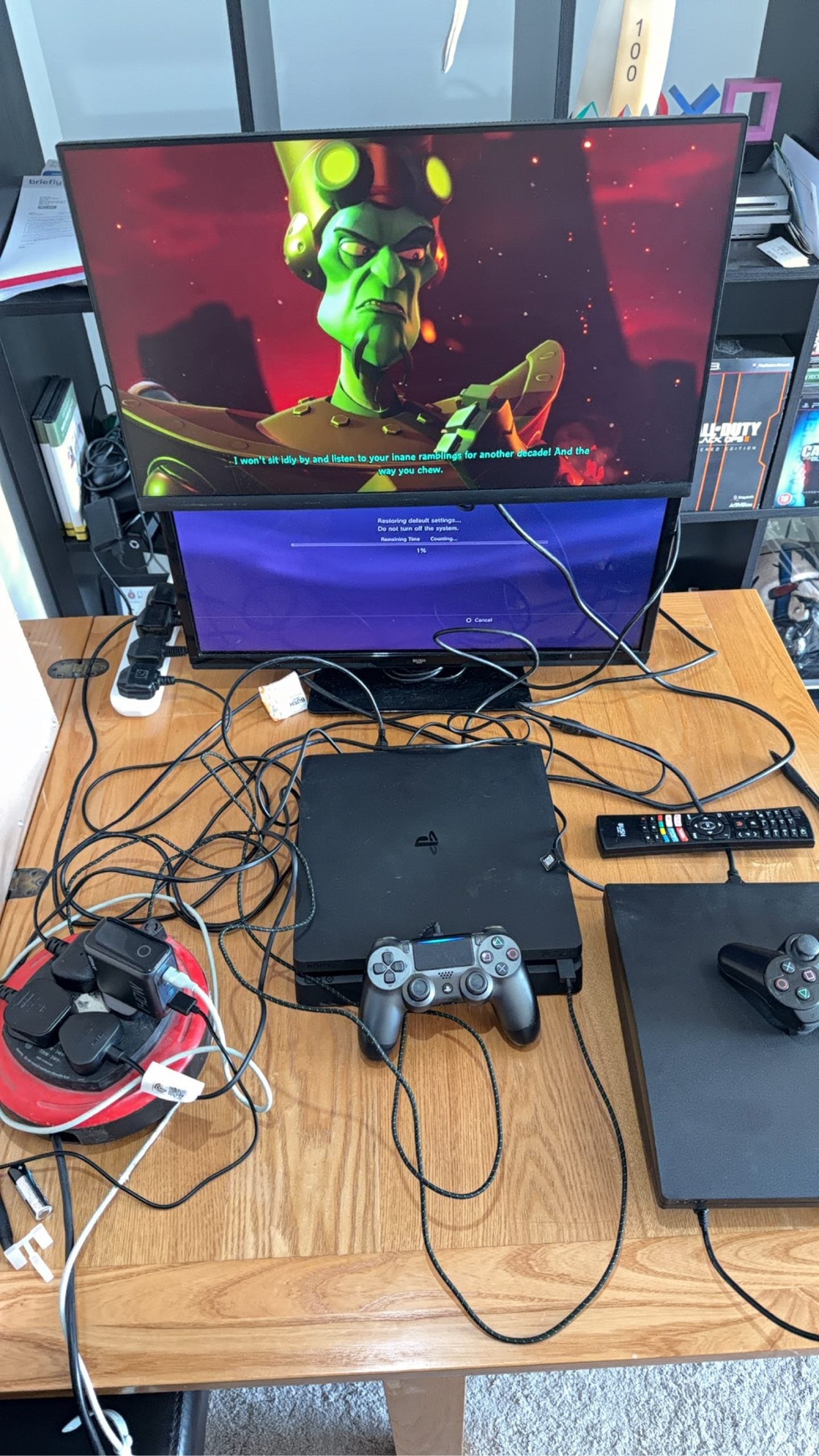 Sony PlayStation 4 Slim 500GB black console with one controller, power and HDMI cables.