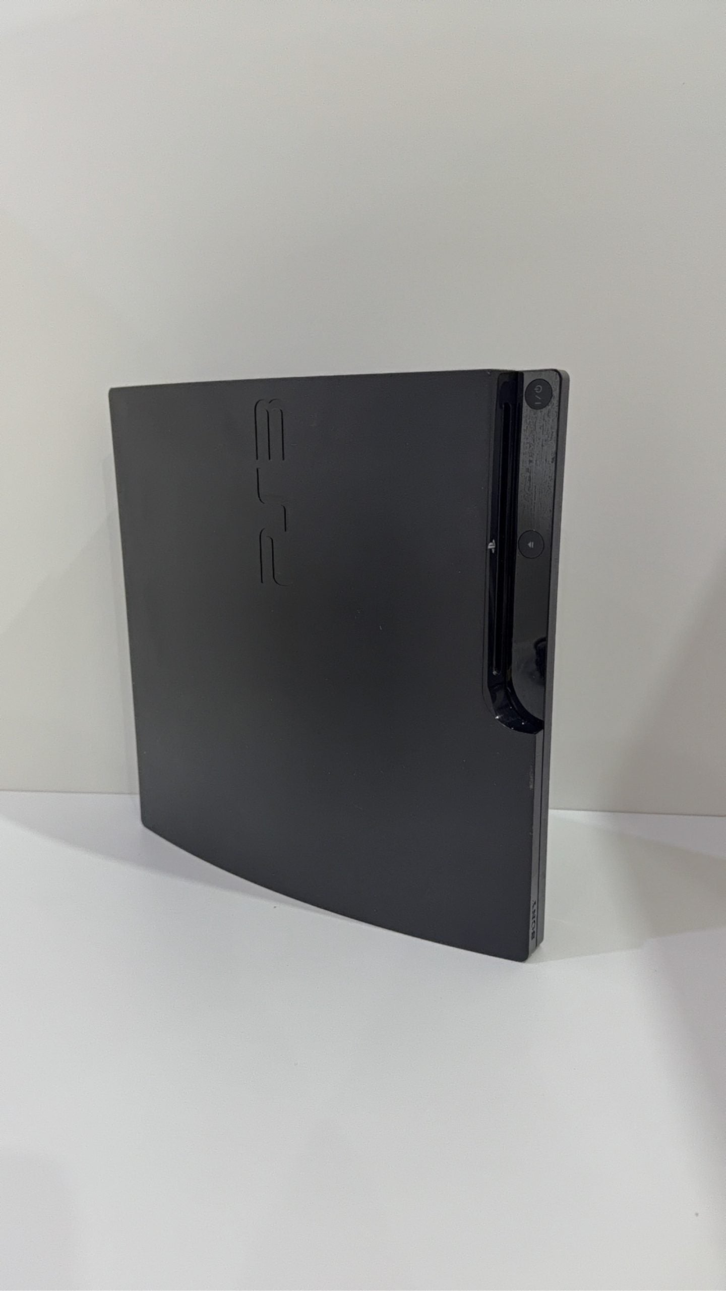 Sony PlayStation 3 PS3 320GB boxed console with official controller, cables, and original booklet.