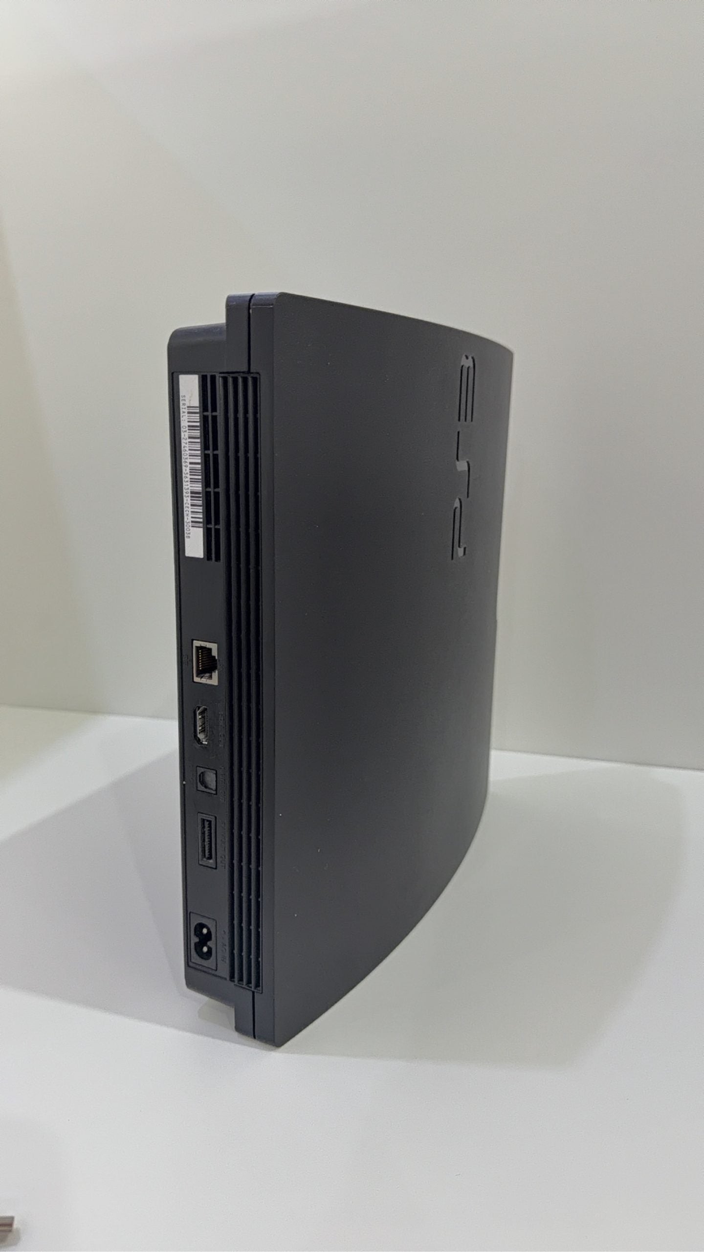 Sony PlayStation 3 PS3 320GB boxed console with official controller, cables, and original booklet.