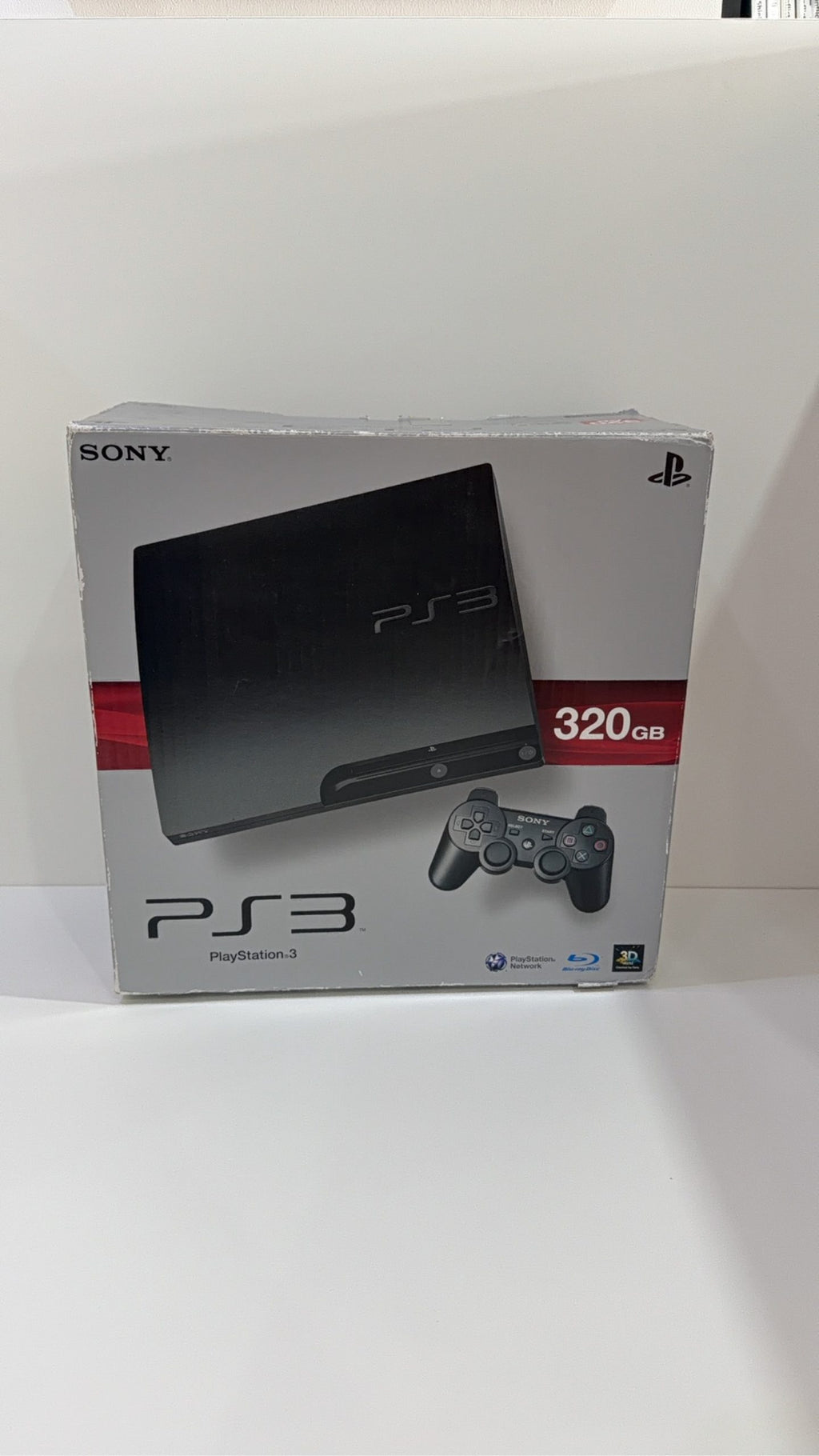 Sony PlayStation 3 PS3 320GB boxed console with official controller, cables, and original booklet.