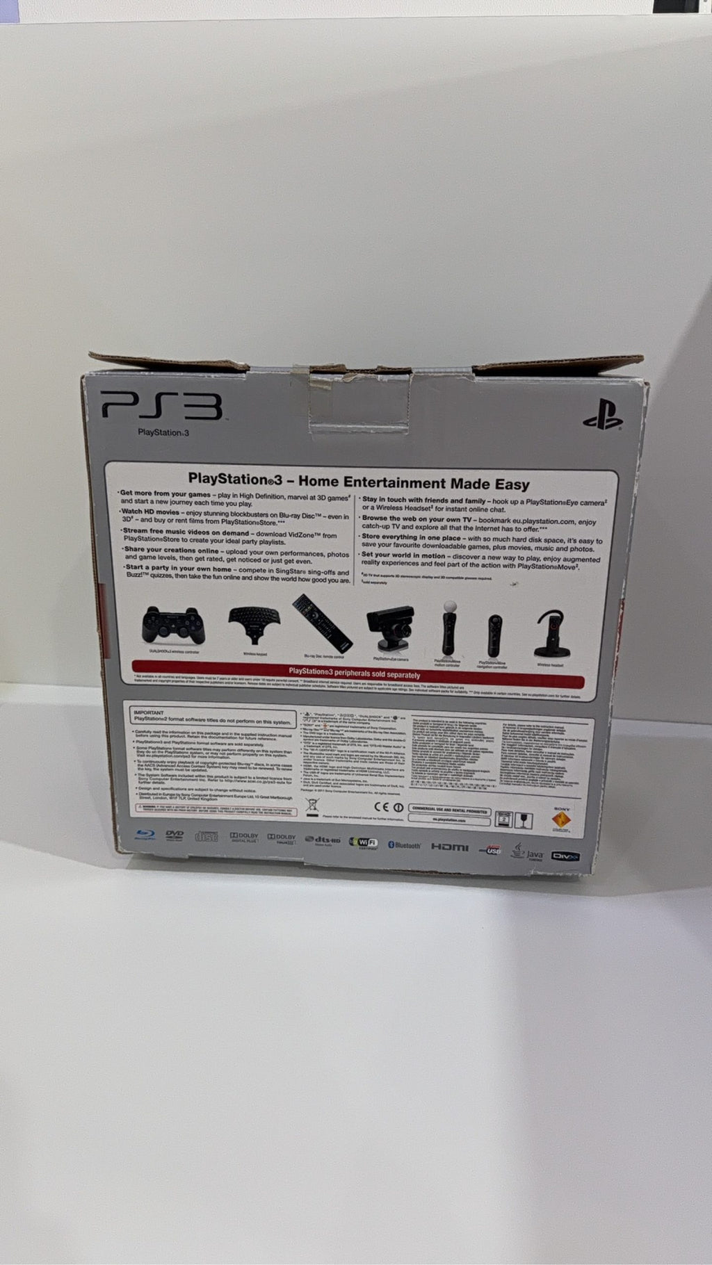 Sony PlayStation 3 PS3 320GB boxed console with official controller, cables, and original booklet.