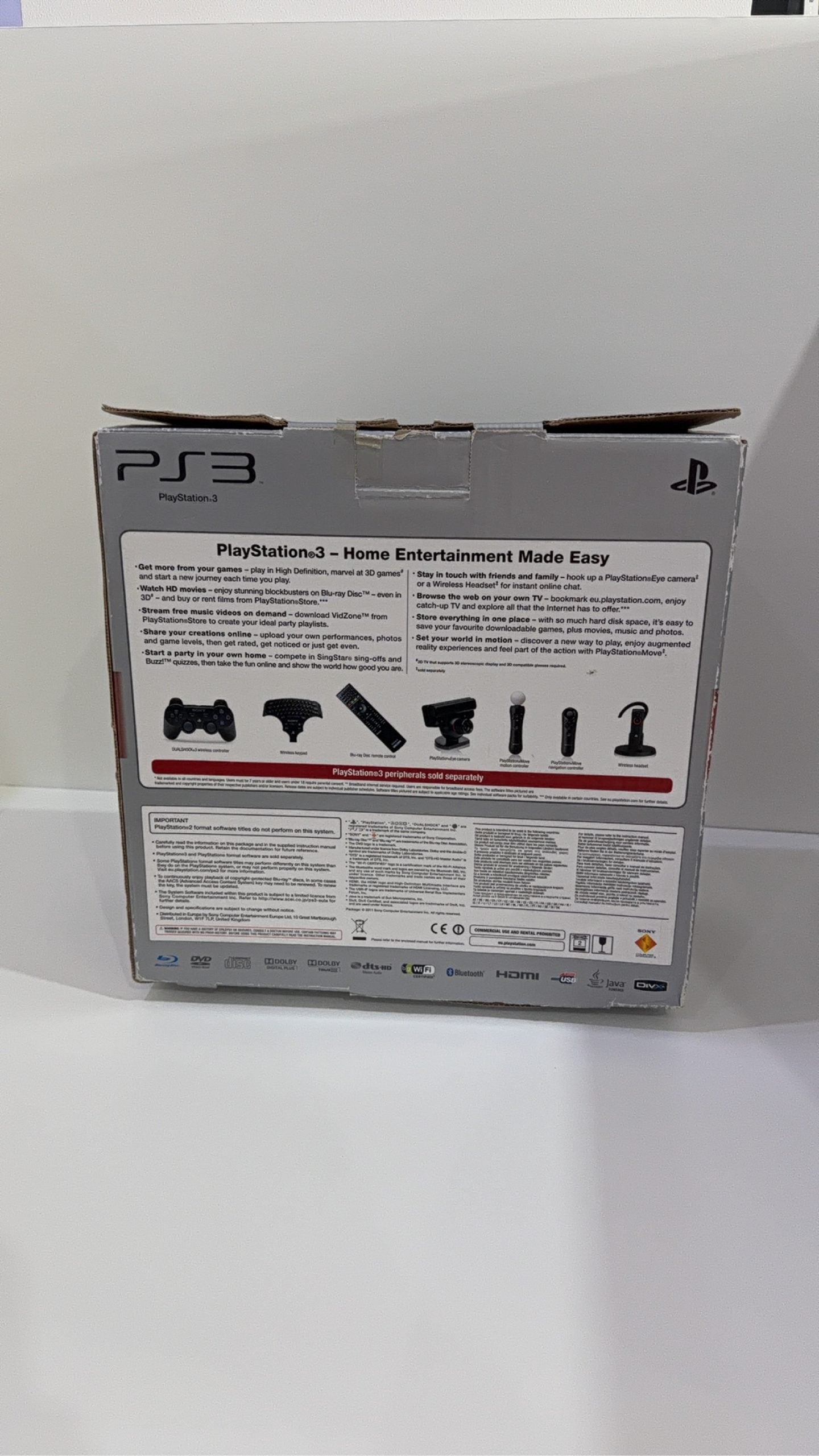 Sony PlayStation 3 PS3 320GB boxed console with official controller, cables, and original booklet.