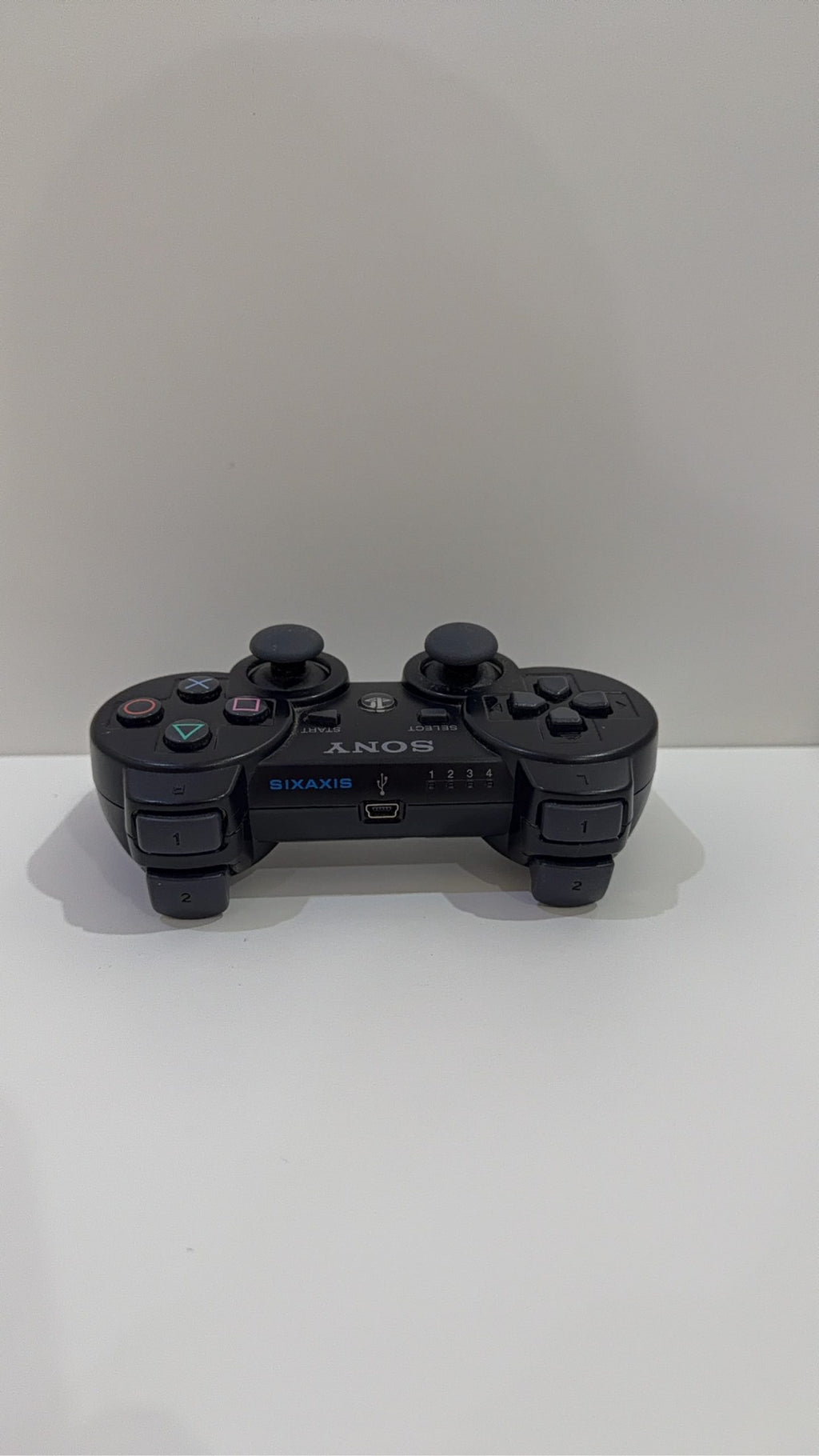 Sony PlayStation 3 PS3 320GB boxed console with official controller, cables, and original booklet.