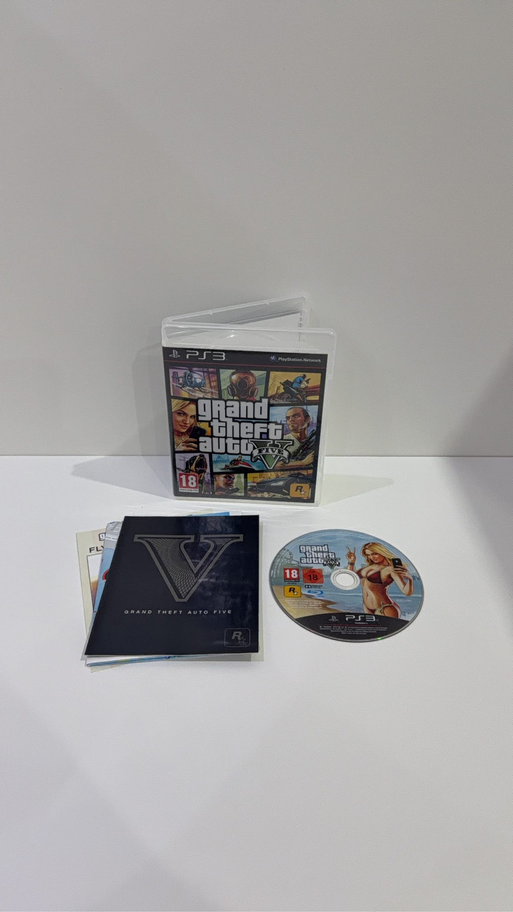 Grand Theft Auto V GTA 5 for Sony PlayStation 3 PS3 with case, manual, and map.