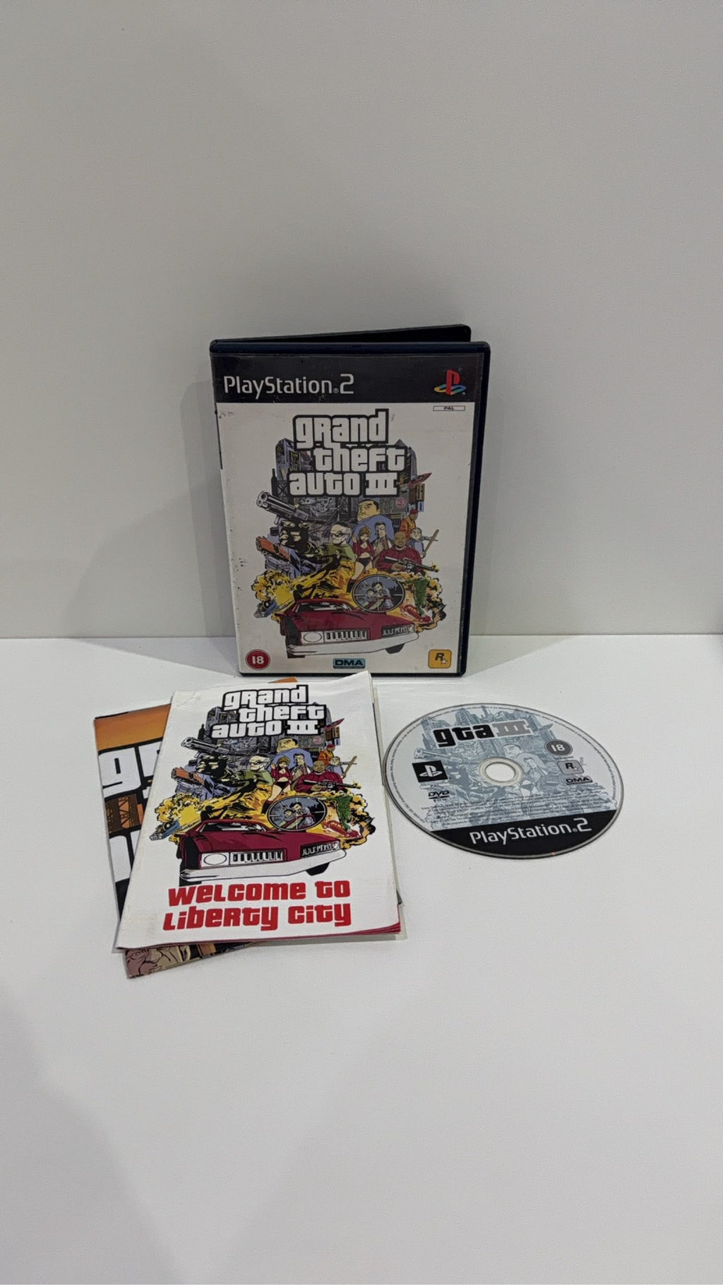 Grand Theft Auto III GTA 3 for Sony PlayStation 2 PS2 with case, manual, and map.