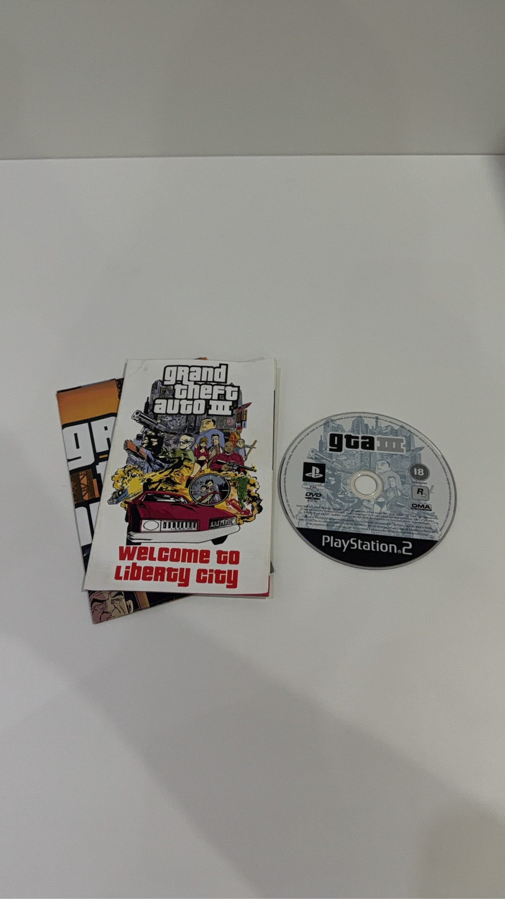 Grand Theft Auto III GTA 3 for Sony PlayStation 2 PS2 with case, manual, and map.