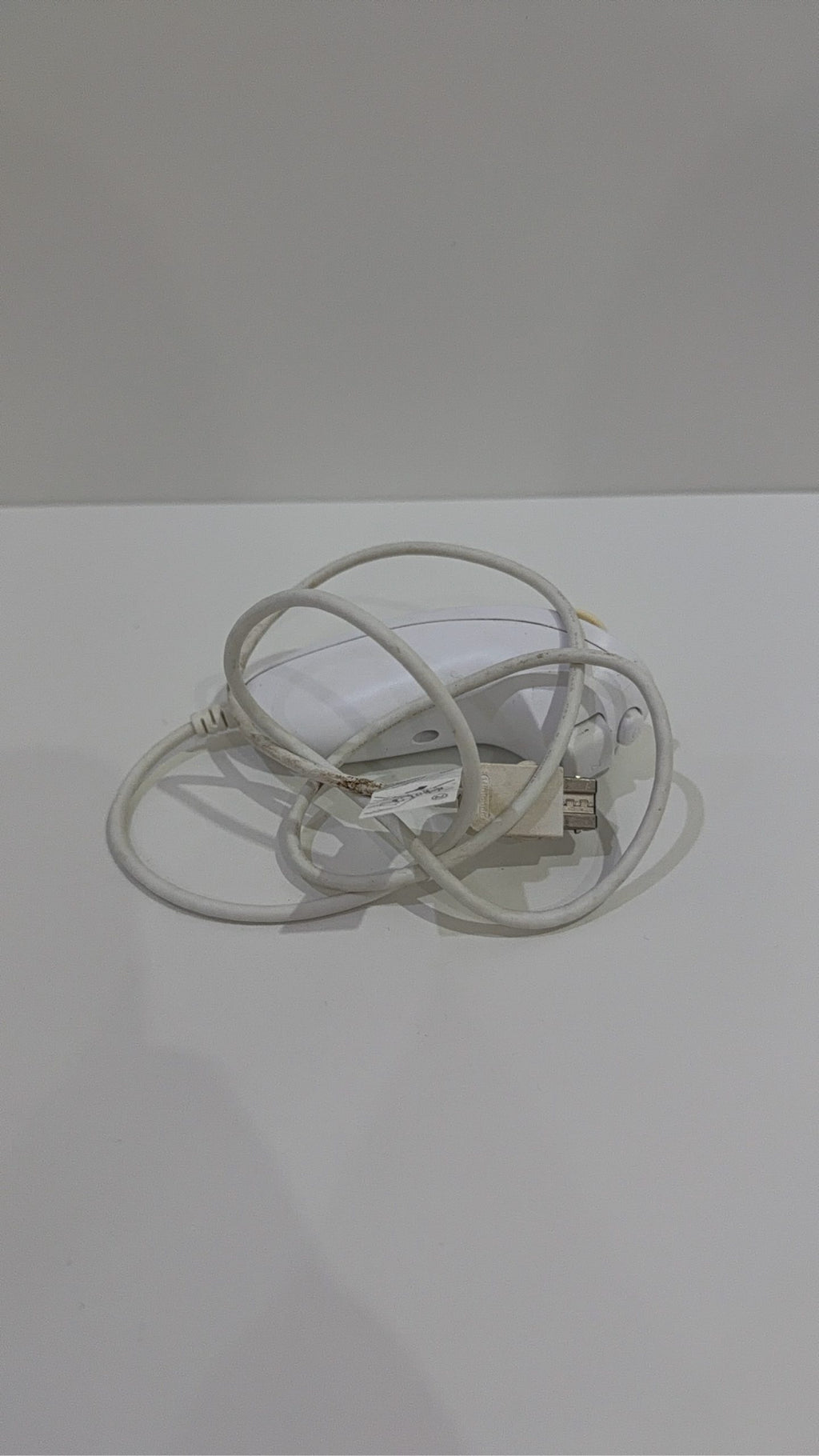 Official Nintendo Wii Nunchuk Controller in white, genuine accessory, tested and working.