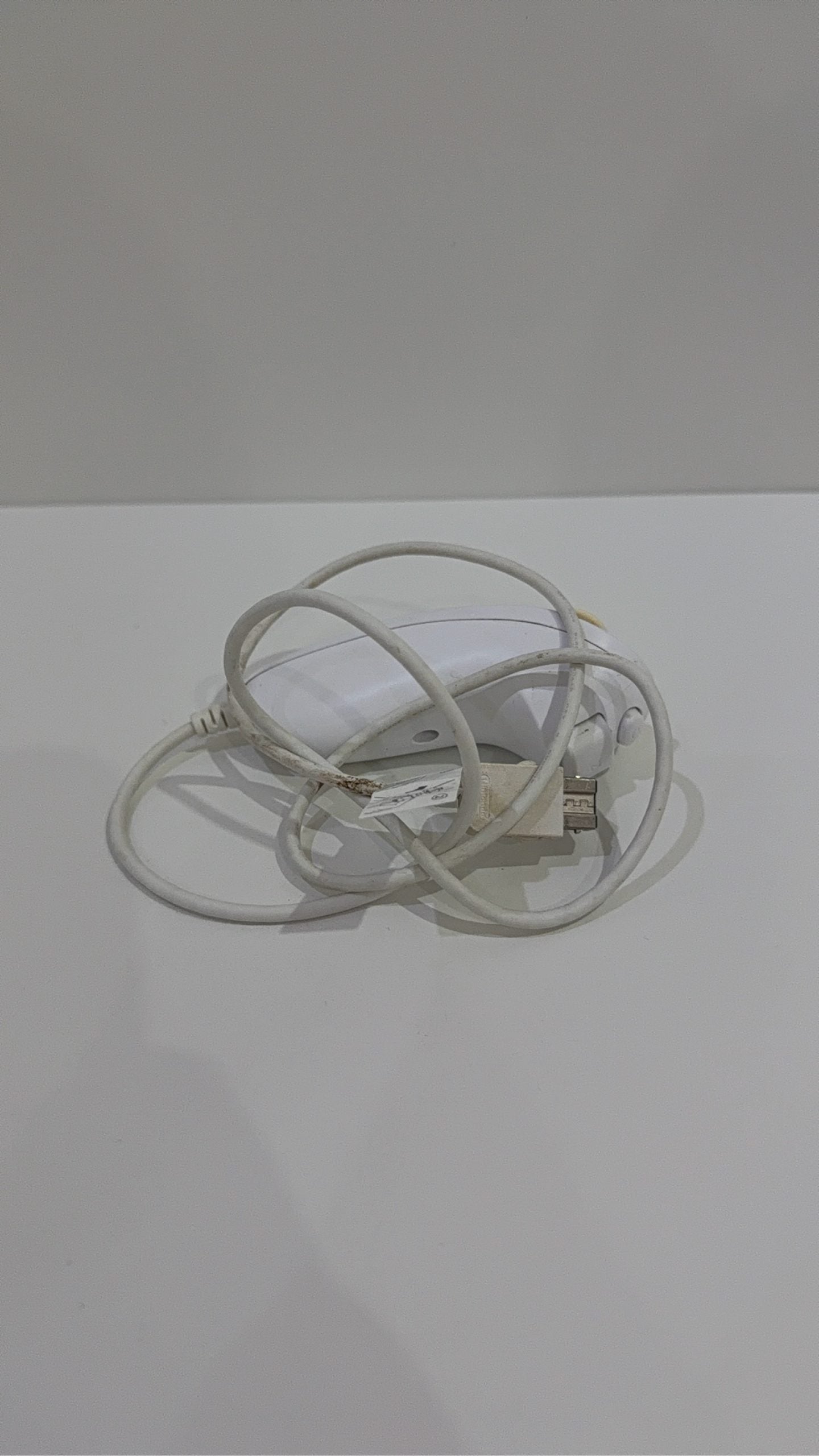 Official Nintendo Wii Nunchuk Controller in white, genuine accessory, tested and working.