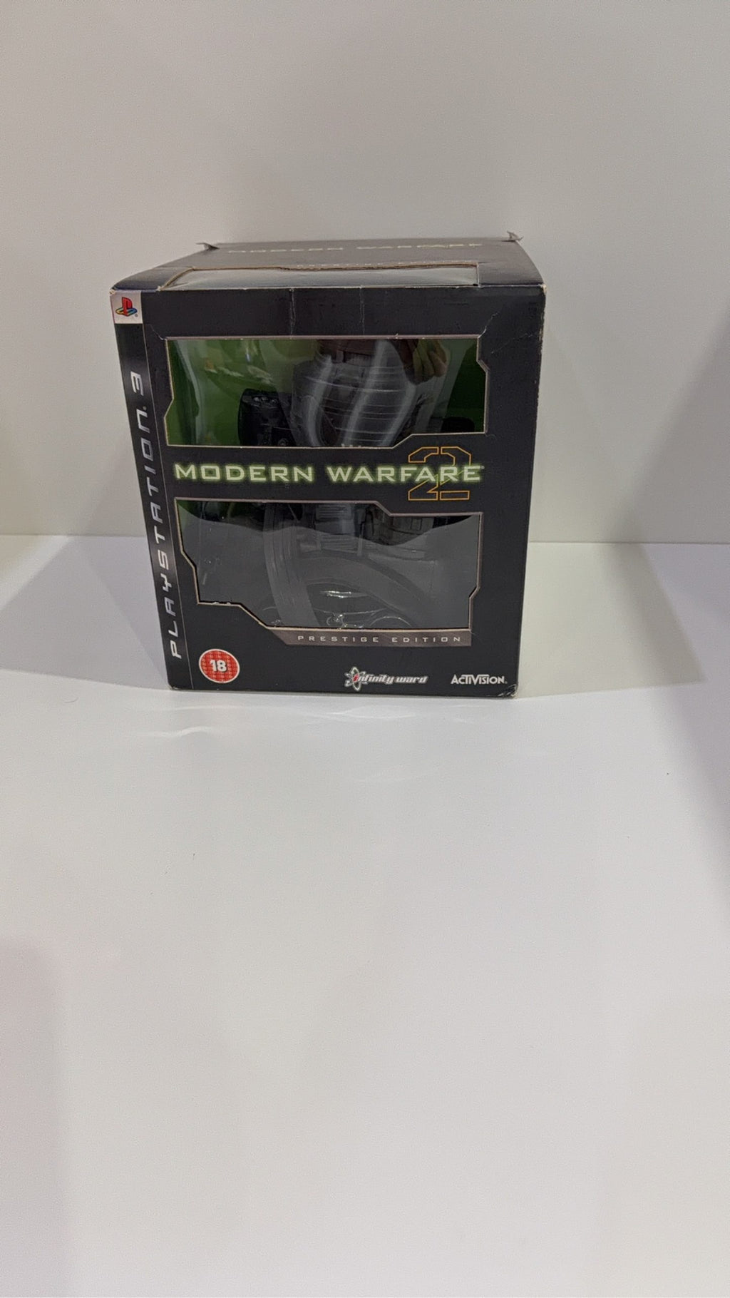 Call of Duty Modern Warfare 2 Prestige Edition PS3 with Night Vision Goggles and display stand.