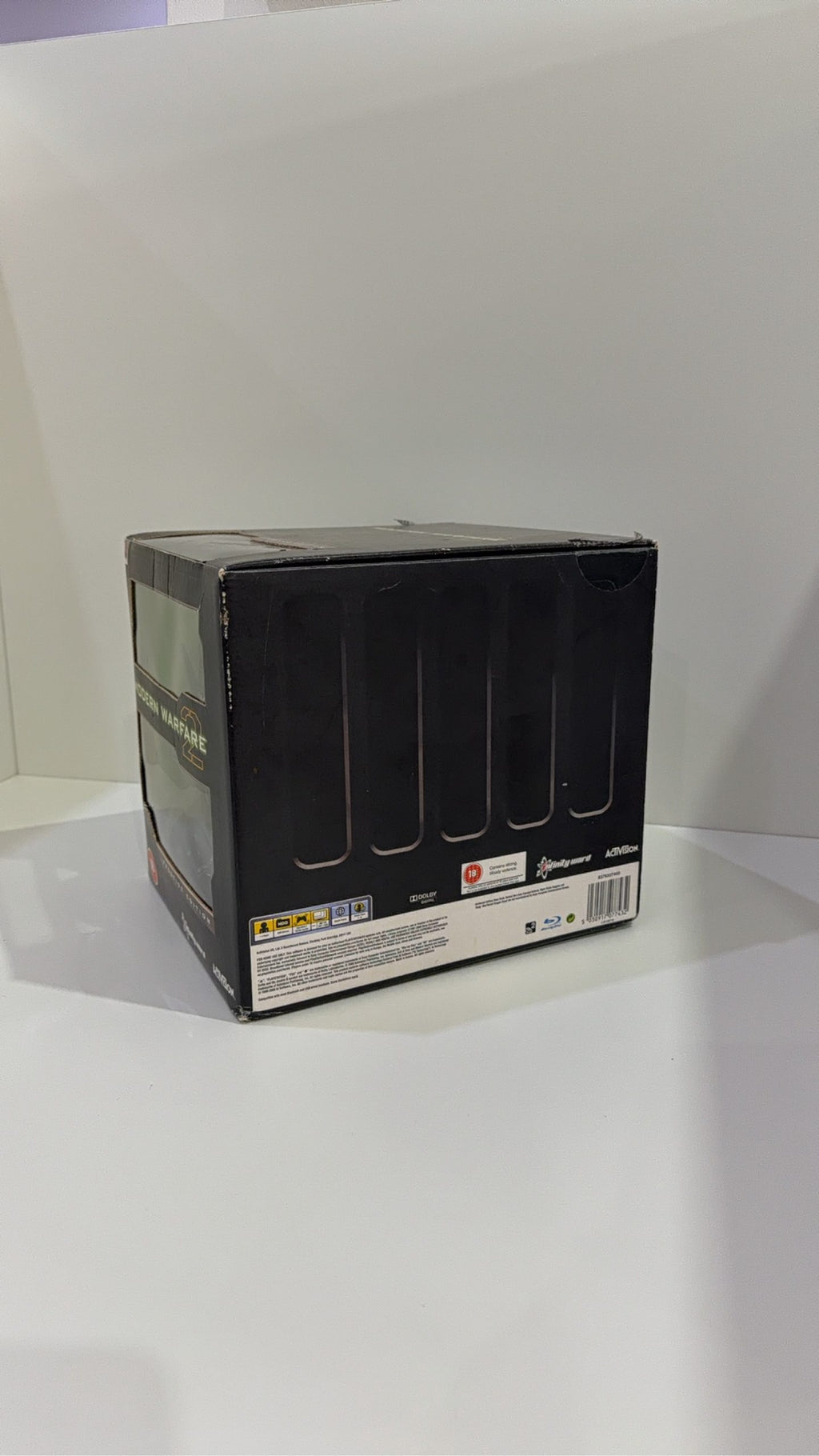 Call of Duty Modern Warfare 2 Prestige Edition PS3 with Night Vision Goggles and display stand.